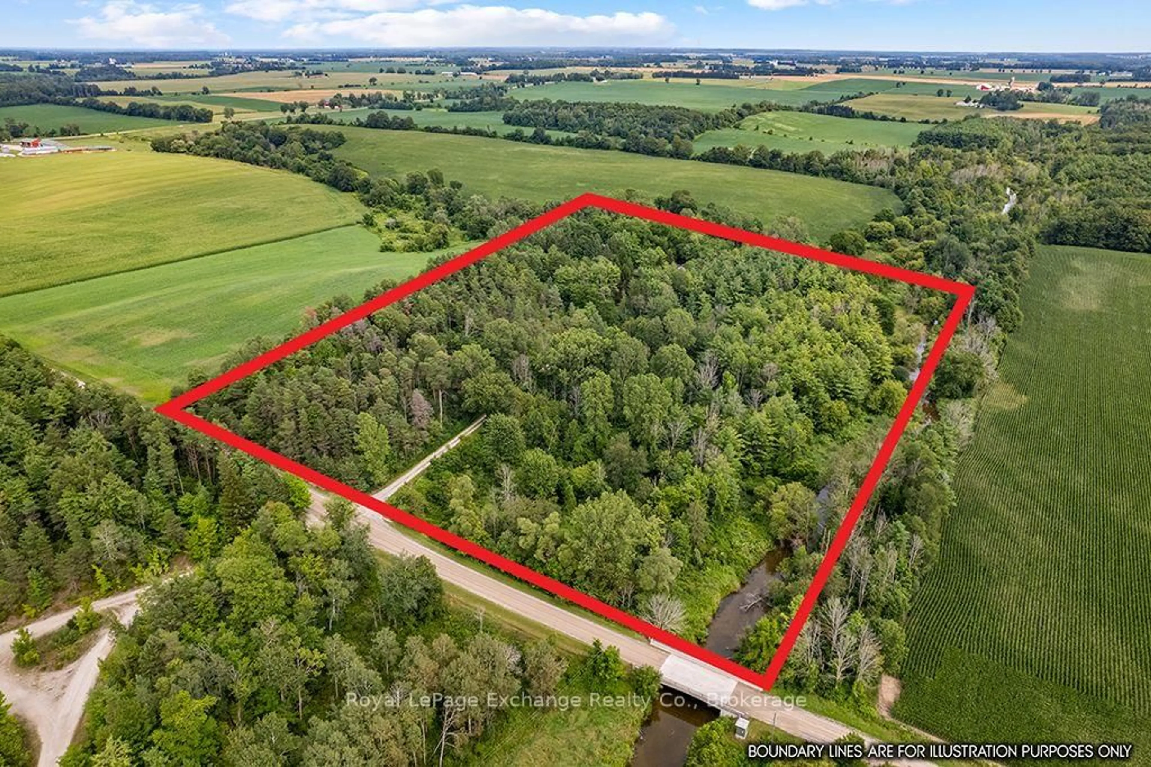 A pic from outside/outdoor area/front of a property/back of a property/a pic from drone, forest/trees view for 83342 Scott Line, North Huron Ontario N0M 1H0