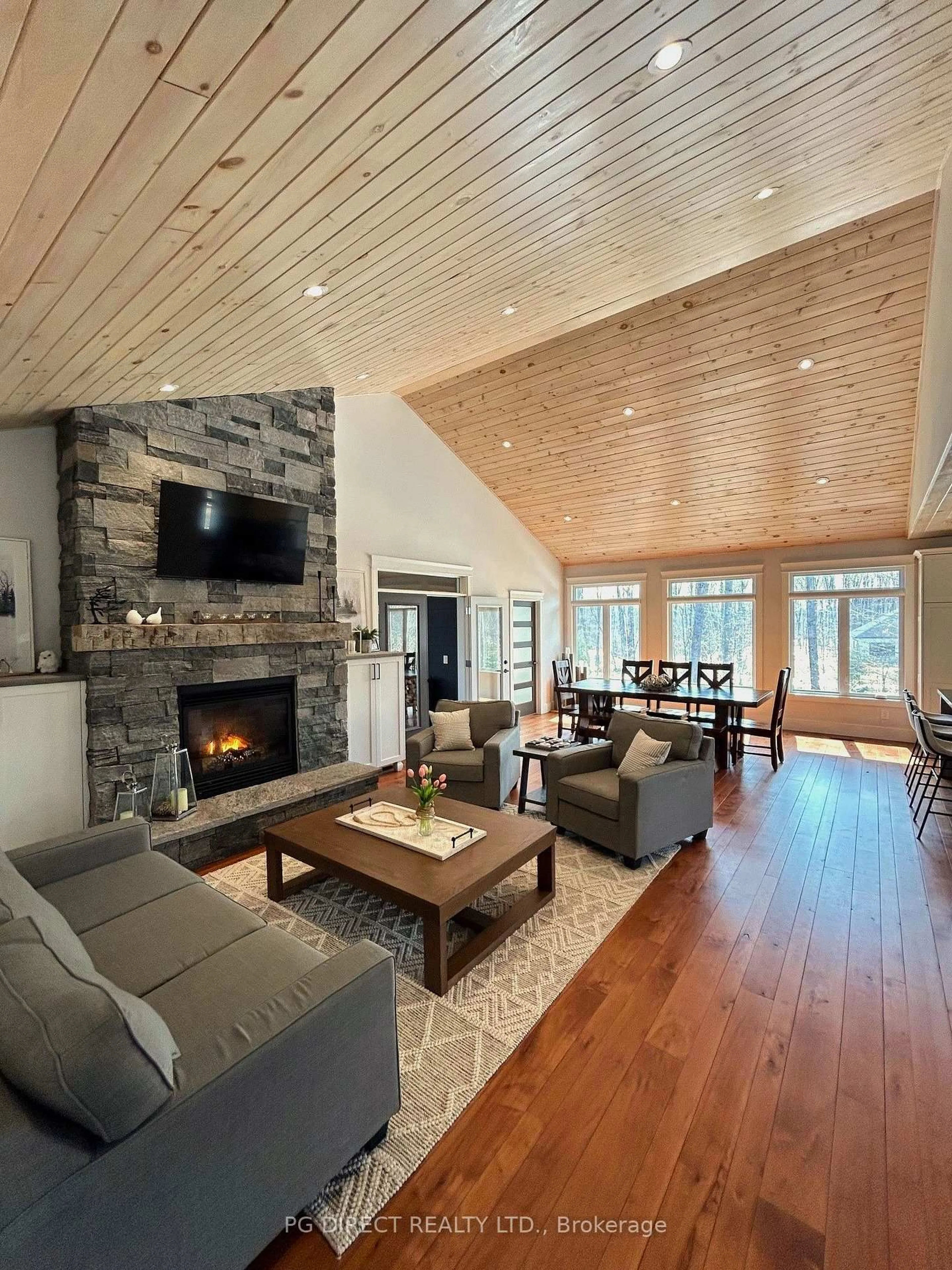 Living room with furniture, wood/laminate floor for 2 Hawk Ridge Crt, Huntsville Ontario P1H 0A7