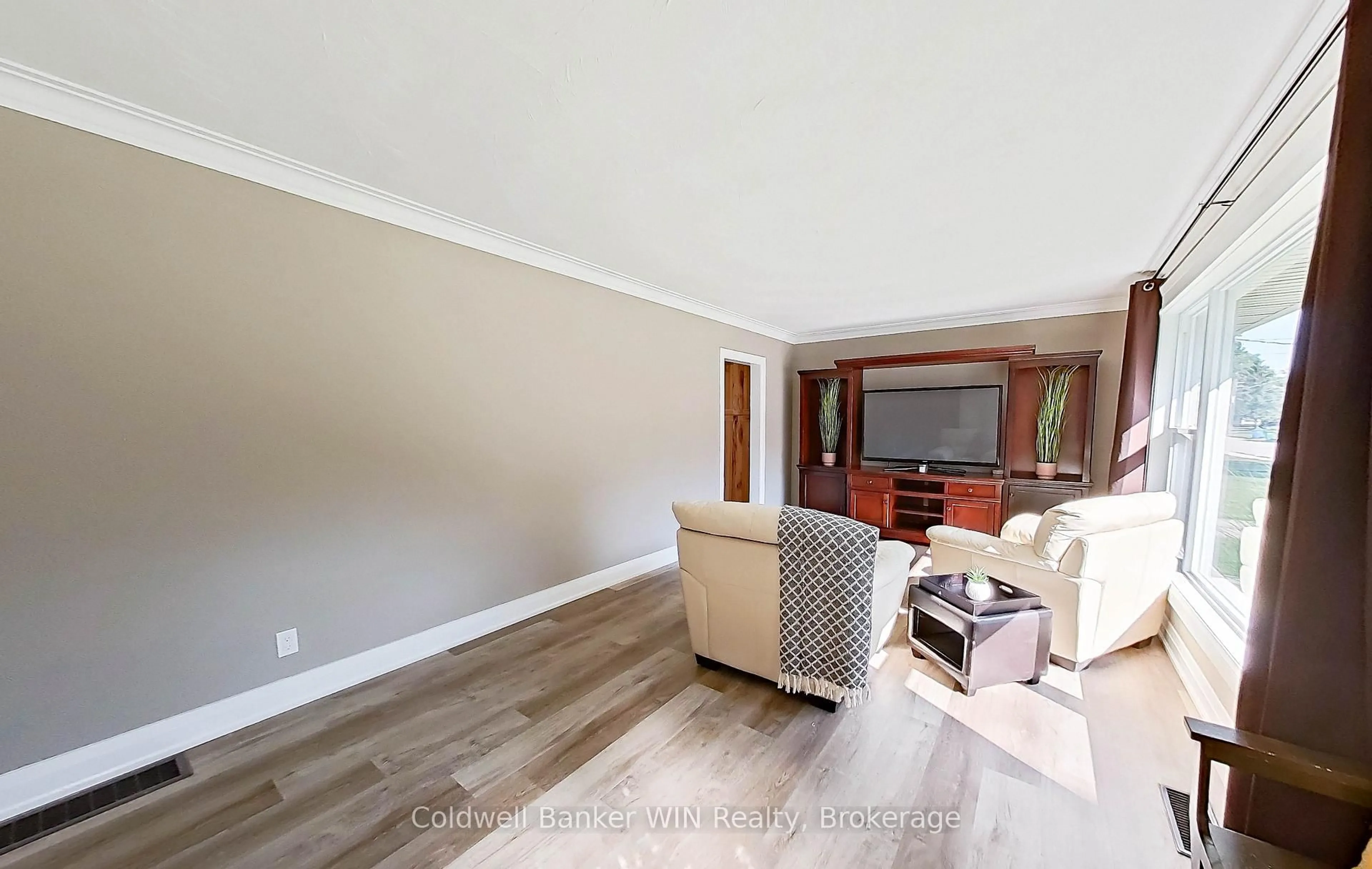 Living room with furniture, wood/laminate floor for 278 Queen St, West Grey Ontario N0G 1R0