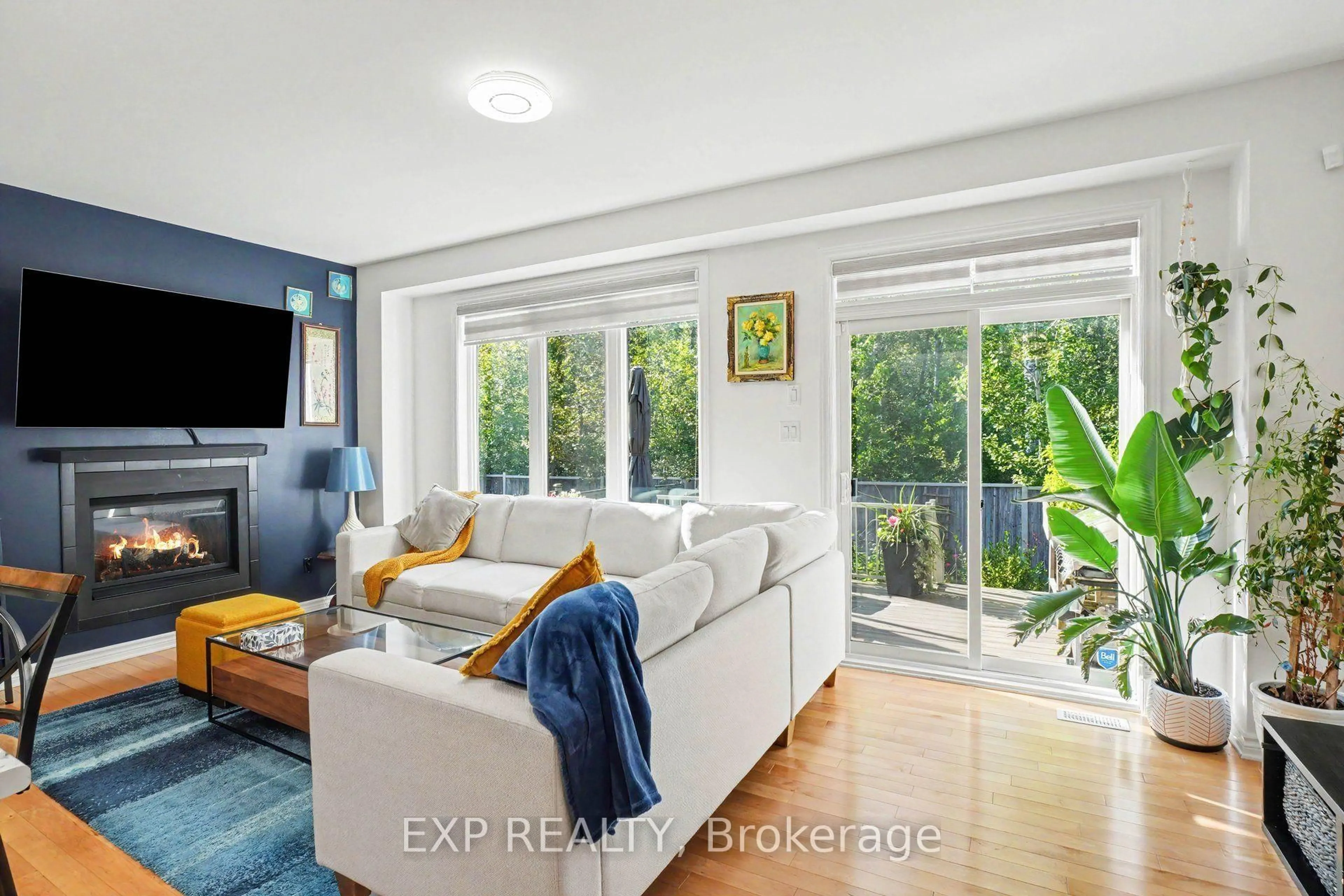 Living room with furniture, unknown for 897 Bunchberry Way, Ottawa Ontario K1T 3T8