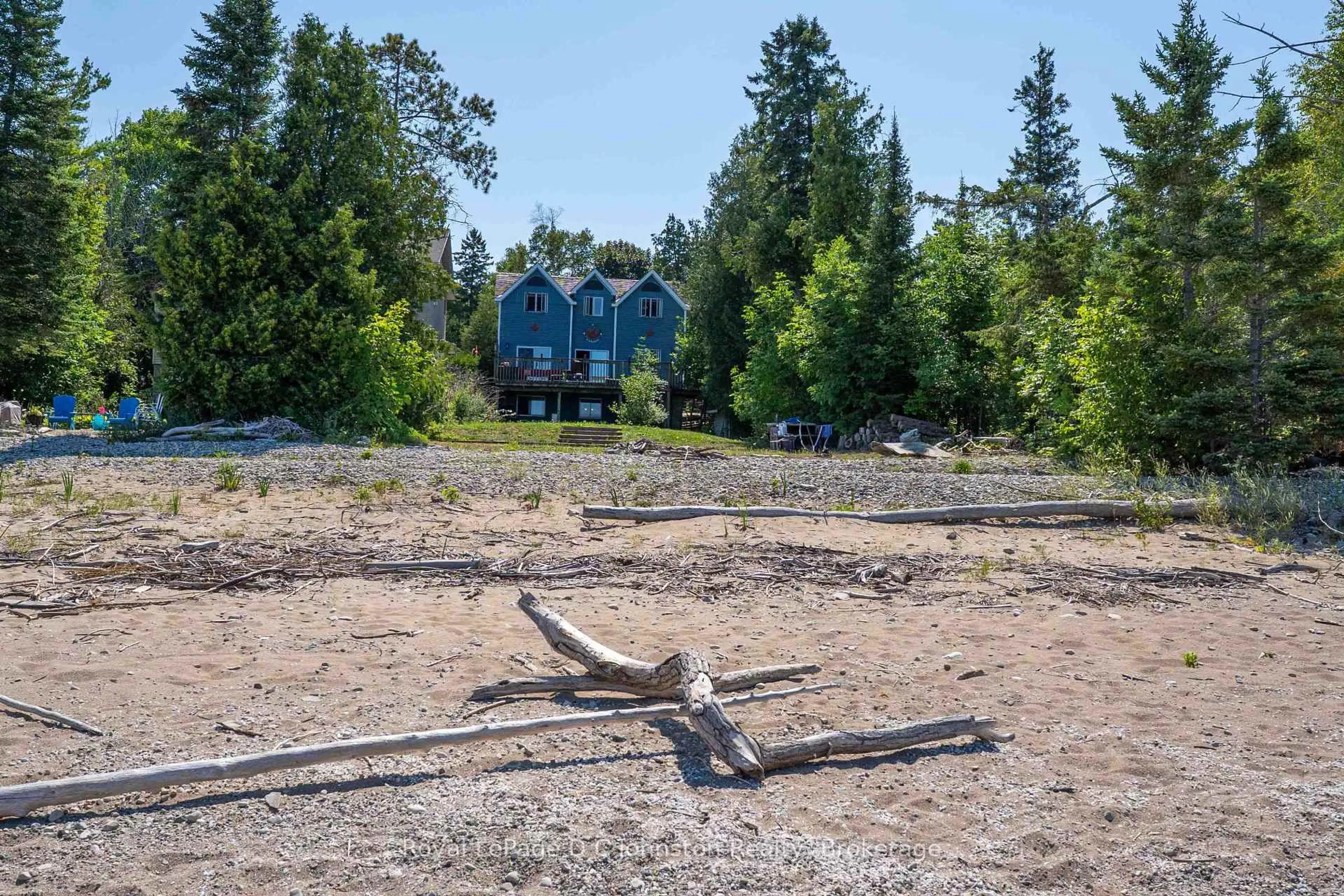 A pic from outside/outdoor area/front of a property/back of a property/a pic from drone, forest/trees view for 254 Blanchfield Rd, Saugeen Shores Ontario N0H 2L0