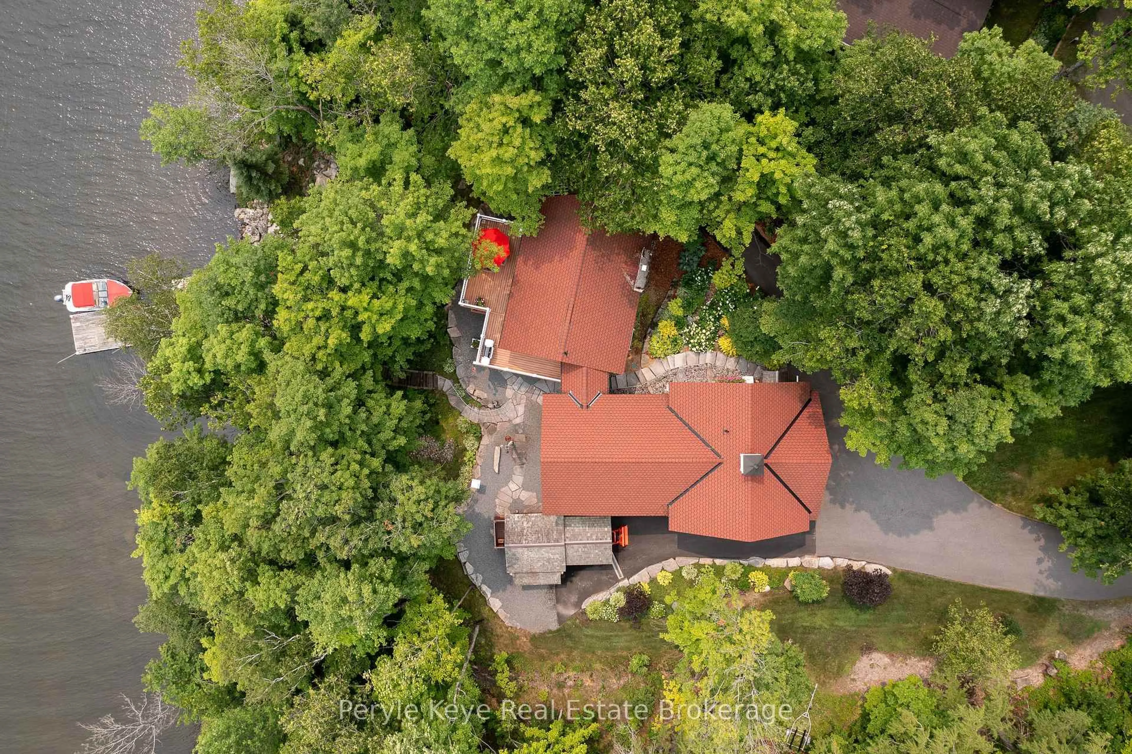 A pic from outside/outdoor area/front of a property/back of a property/a pic from drone, forest/trees view for 1159 Maplehurst Dr, Lake of Bays Ontario P1H 2J6