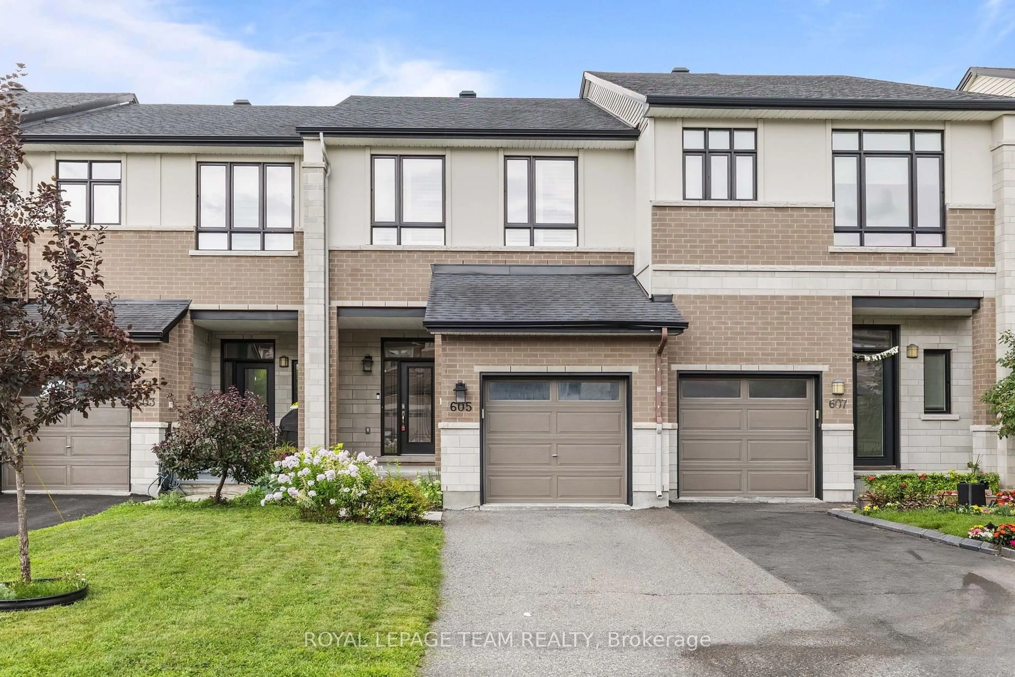 Home with brick exterior material, street for 605 Tennant Way, Ottawa Ontario K4M 0C6