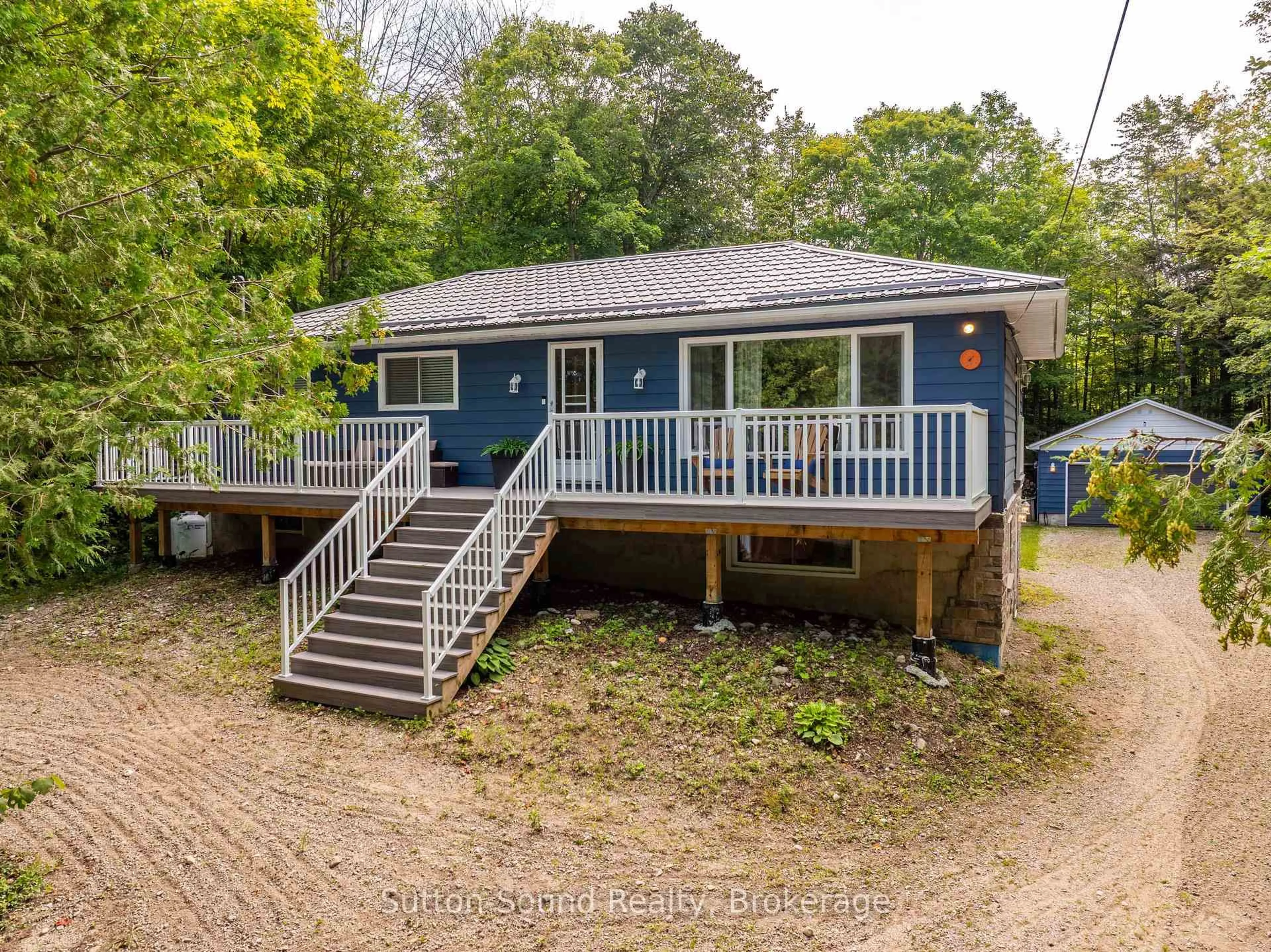 A pic from outside/outdoor area/front of a property/back of a property/a pic from drone, unknown for 54 Roth Dr, South Bruce Peninsula Ontario N0H 2T0