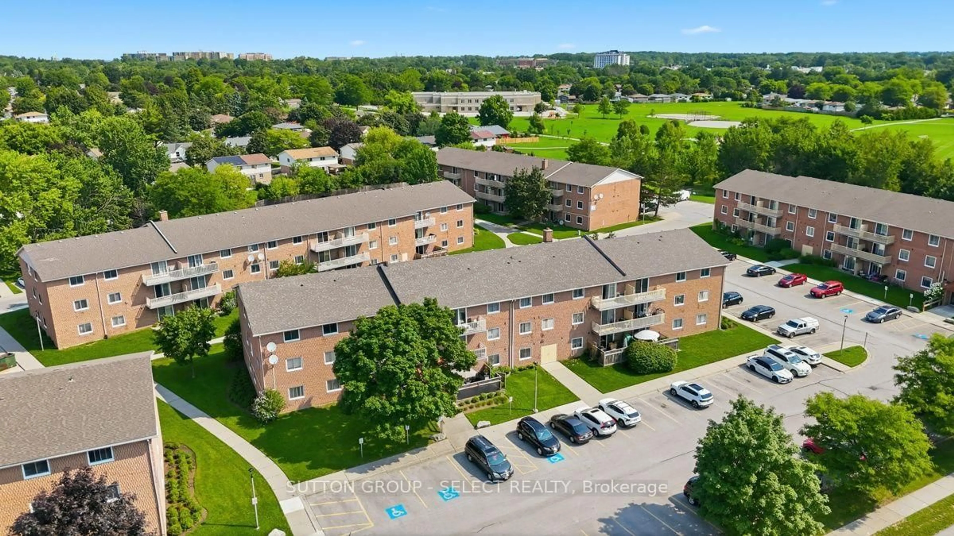 A pic from outside/outdoor area/front of a property/back of a property/a pic from drone, unknown for 1582 Ernest Ave #304, London South Ontario N6B 2G5