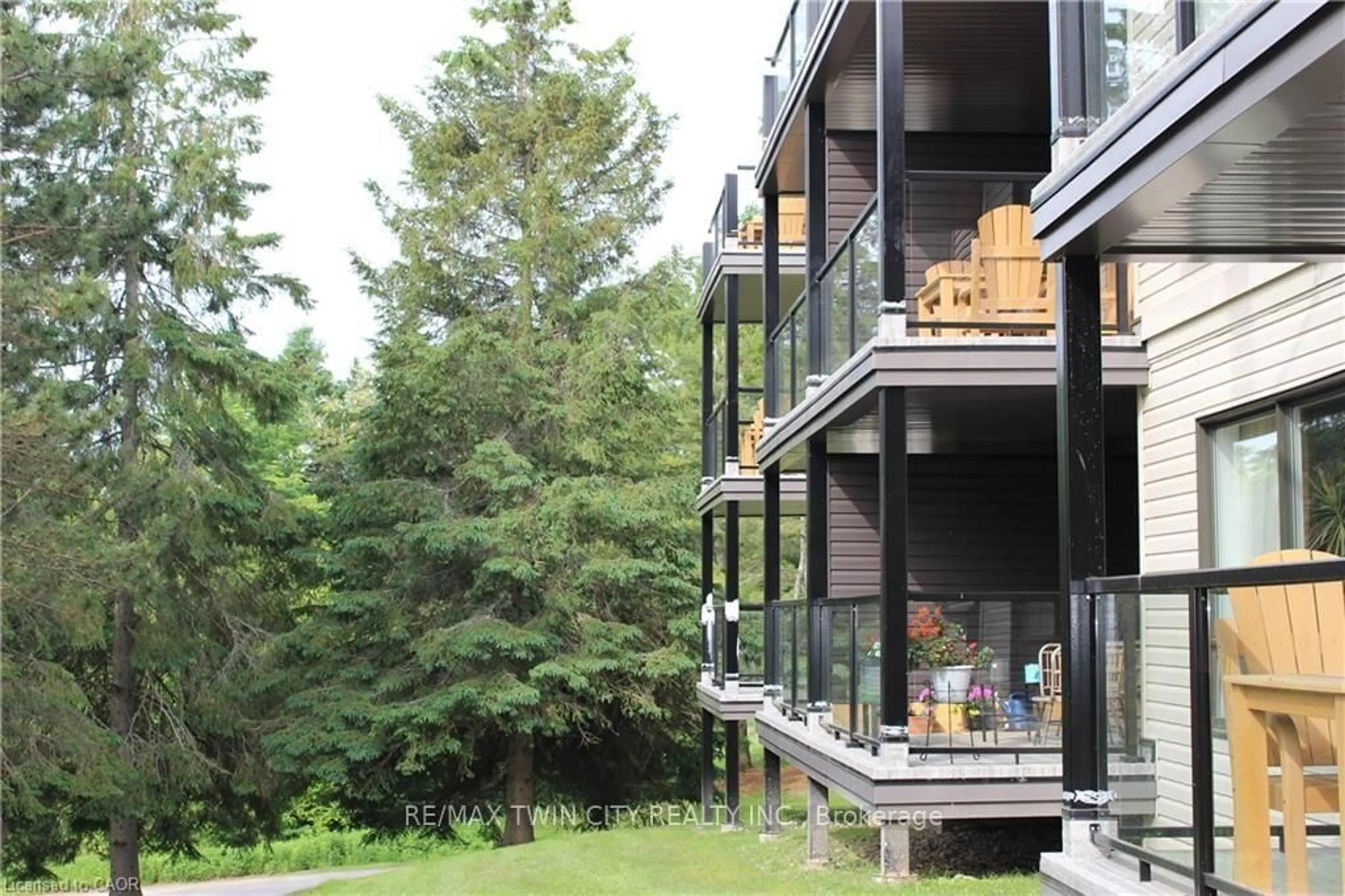 Patio, forest/trees view for 1235 Deerhurst Dr #52-105, Huntsville Ontario P1H 1E8