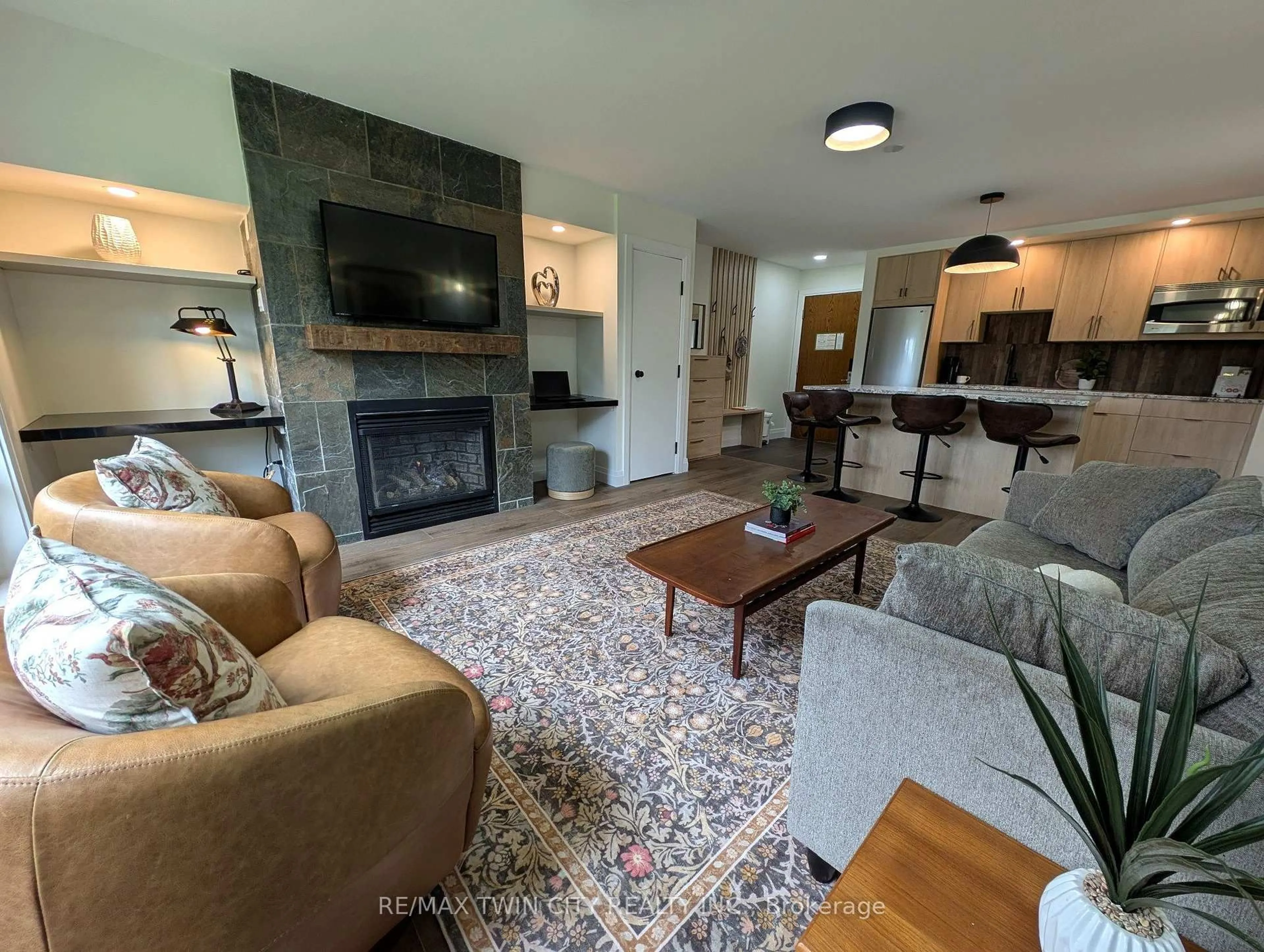 Living room with furniture, unknown for 1235 Deerhurst Dr #52-105, Huntsville Ontario P1H 1E8