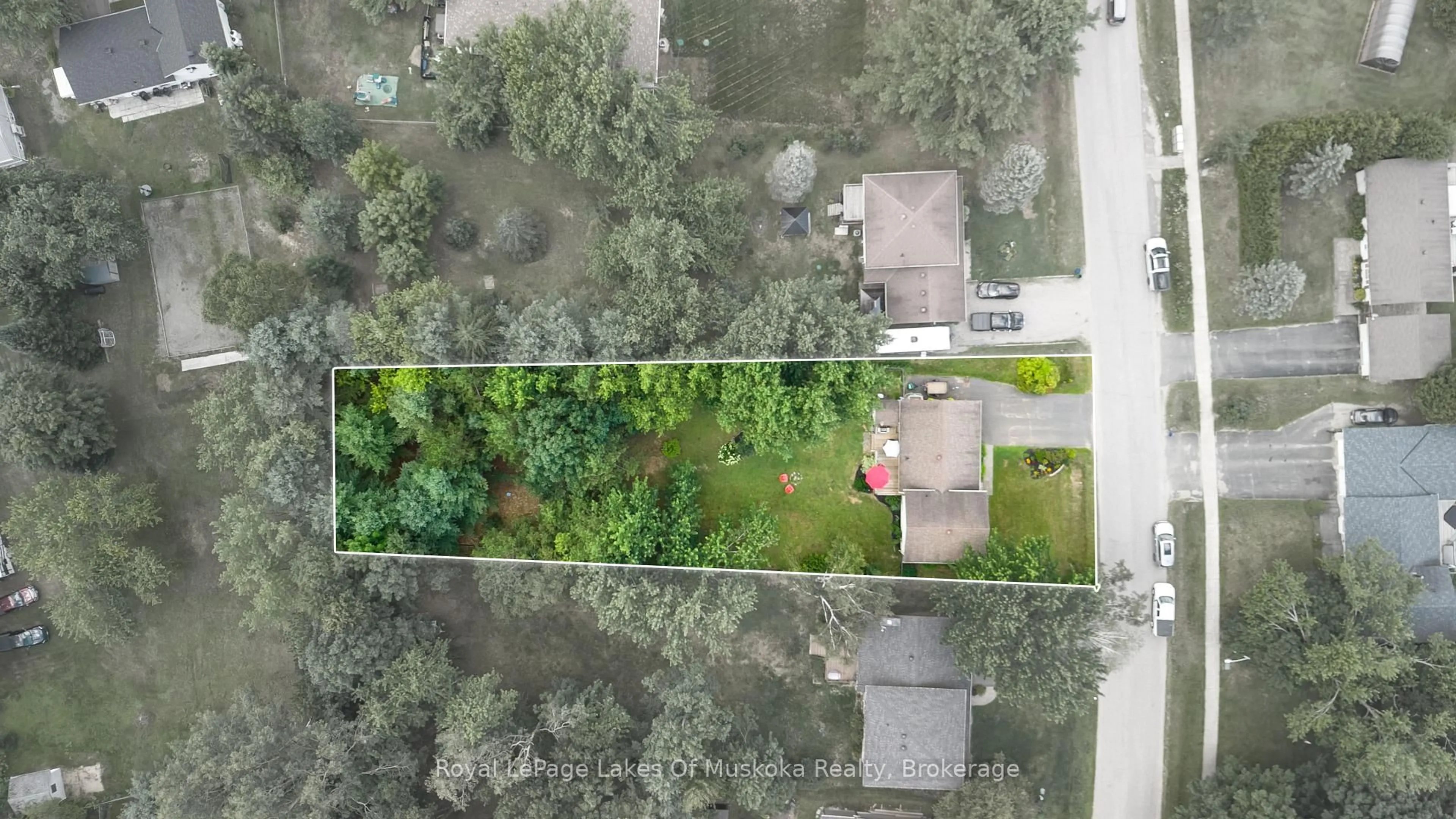 A pic from outside/outdoor area/front of a property/back of a property/a pic from drone, forest/trees view for 45 Kevin Cres, Bracebridge Ontario P1L 1A2