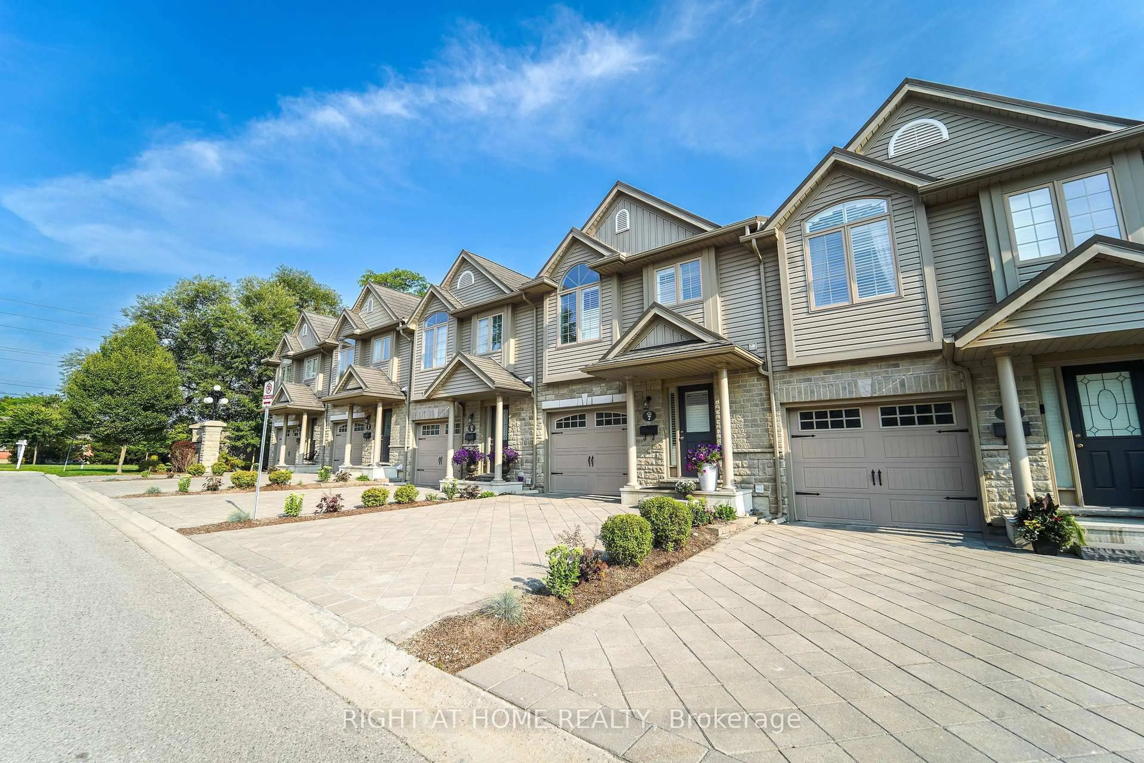 A pic from outside/outdoor area/front of a property/back of a property/a pic from drone, street for 582 Hyde Park Rd #7, London North Ontario N6H 3S1