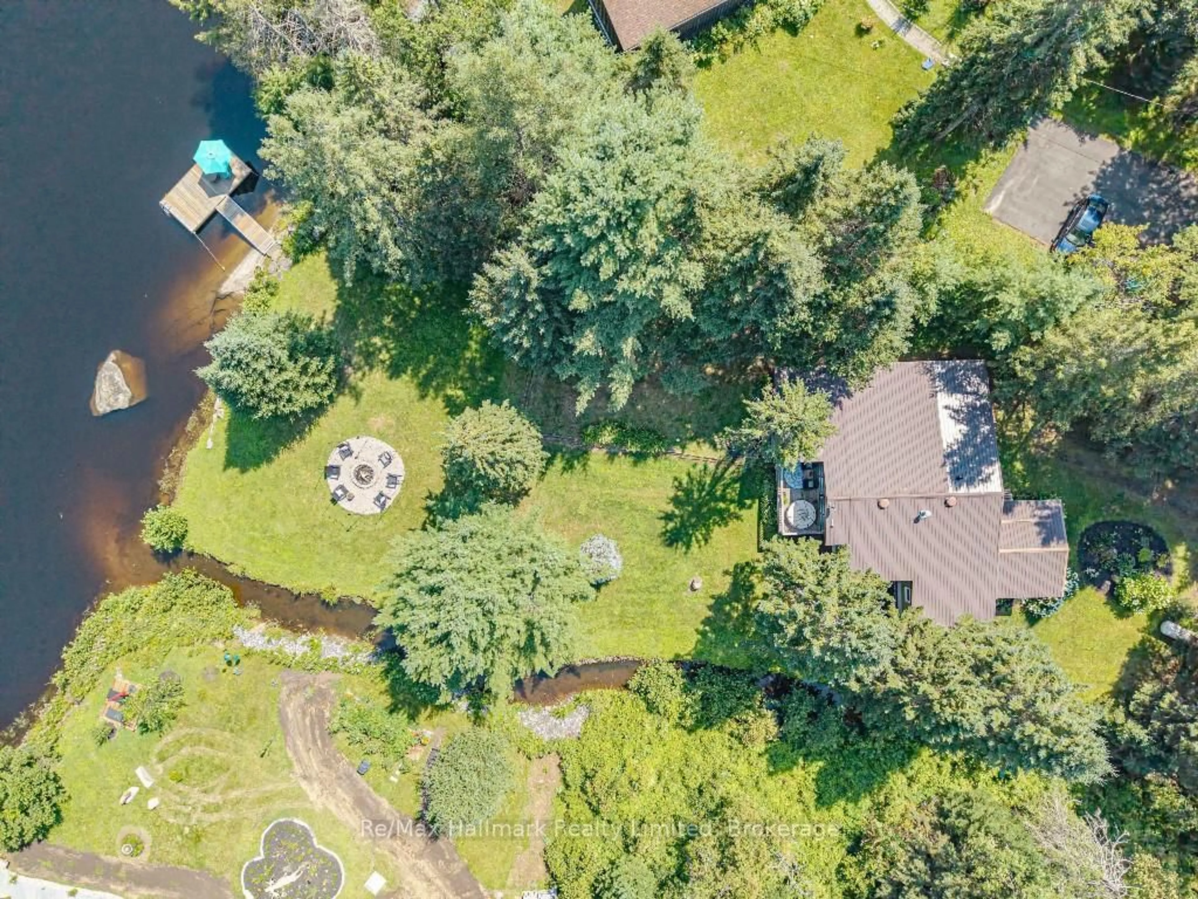 A pic from outside/outdoor area/front of a property/back of a property/a pic from drone, water/lake/river/ocean view for 199 Bonnell Rd, Bracebridge Ontario P1L 1W9