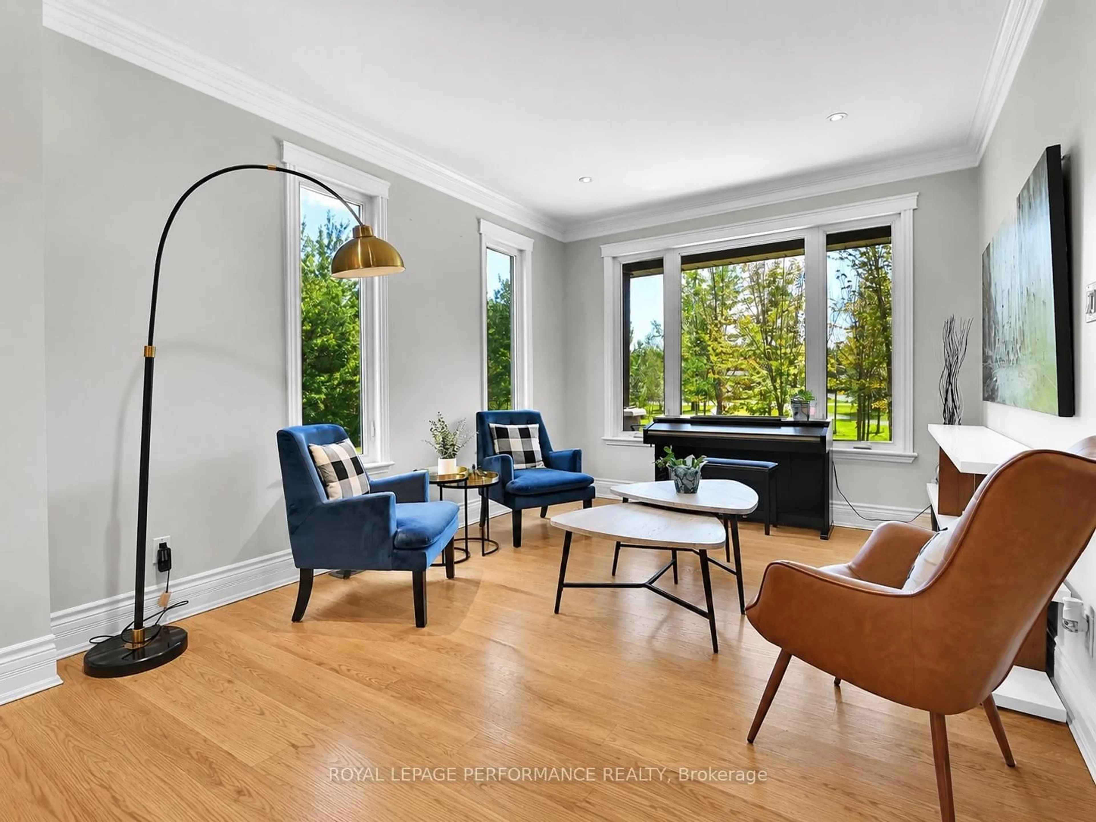 Living room with furniture, wood/laminate floor for 1466 Calypso St, The Nation Ontario K0A 2M0
