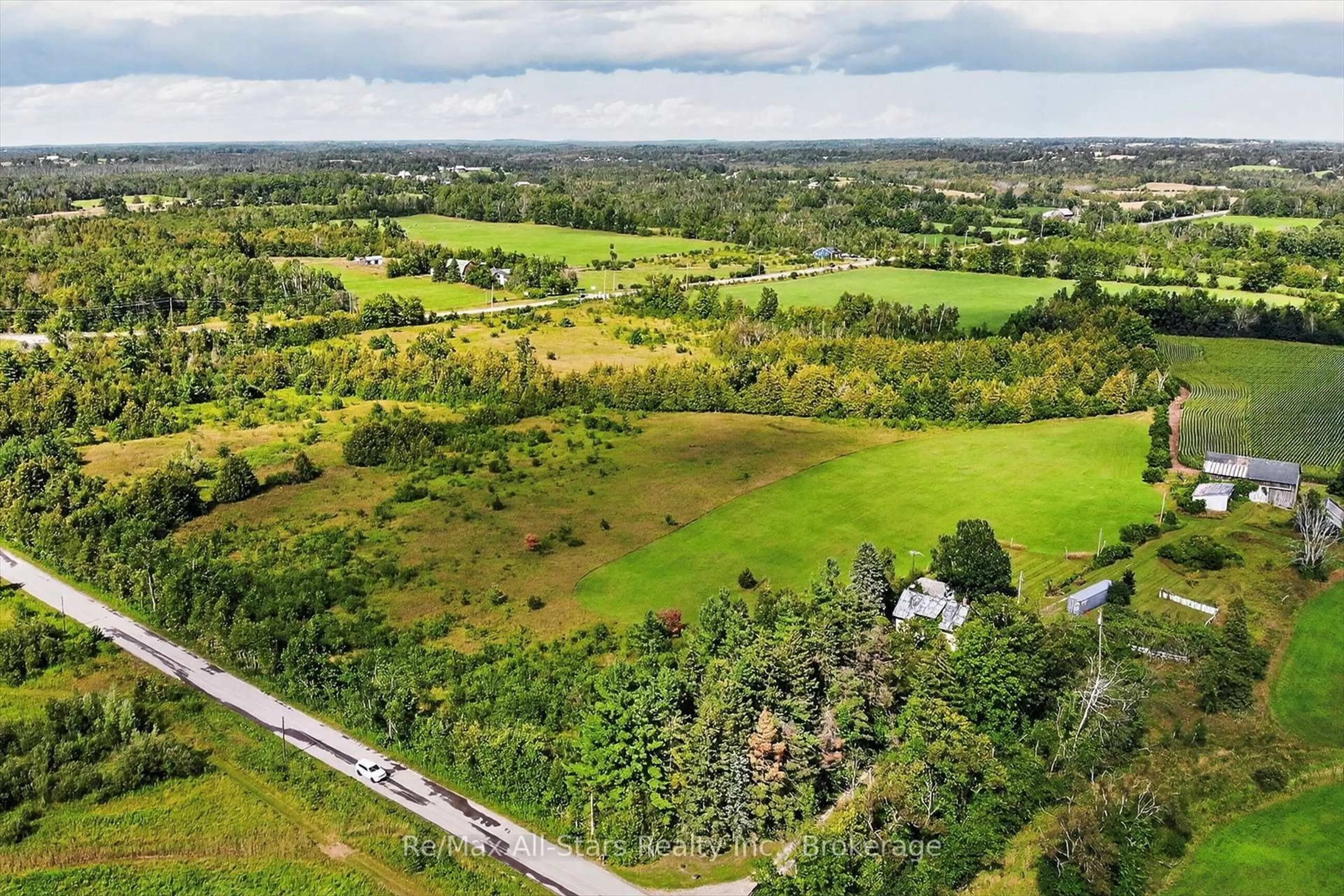 A pic from outside/outdoor area/front of a property/back of a property/a pic from drone, forest/trees view for 37 Kelly's Bay Rd, Kawartha Lakes Ontario K0M 1N0