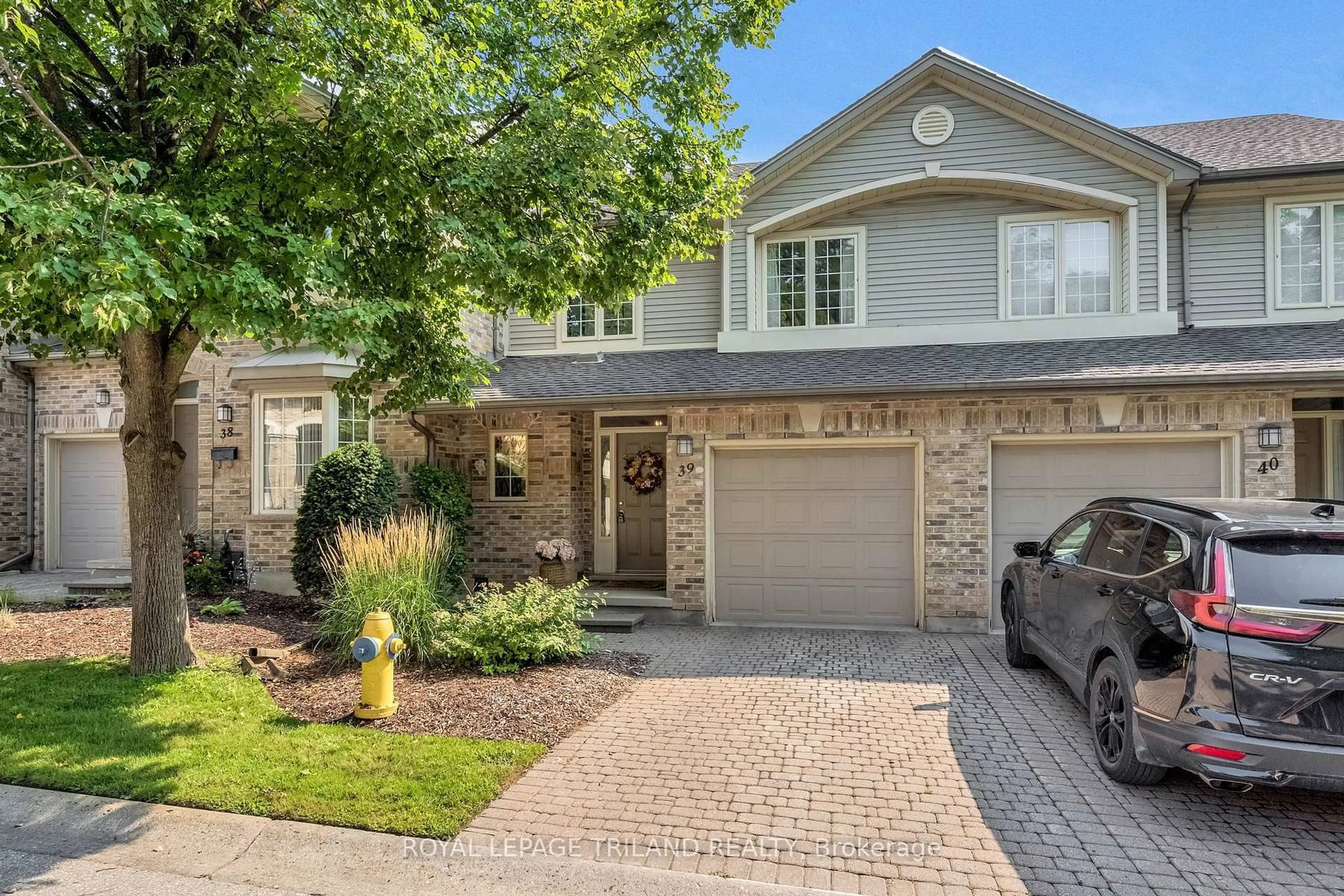 Home with brick exterior material, street for 519 Riverside Dr #39, London North Ontario N6H 5J3