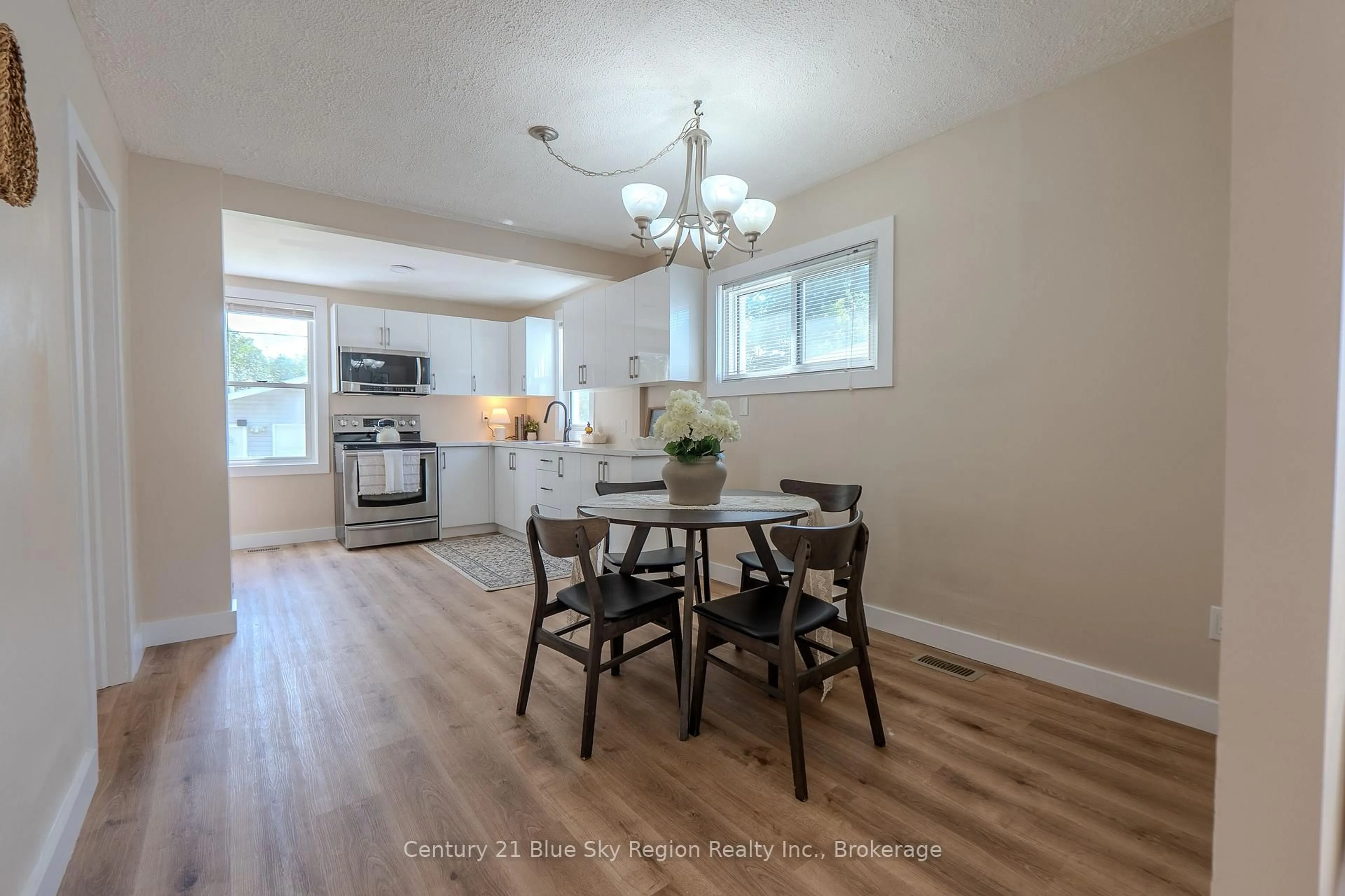 Open concept kitchen, wood/laminate floor for 452 King St, North Bay Ontario P1B 6A2