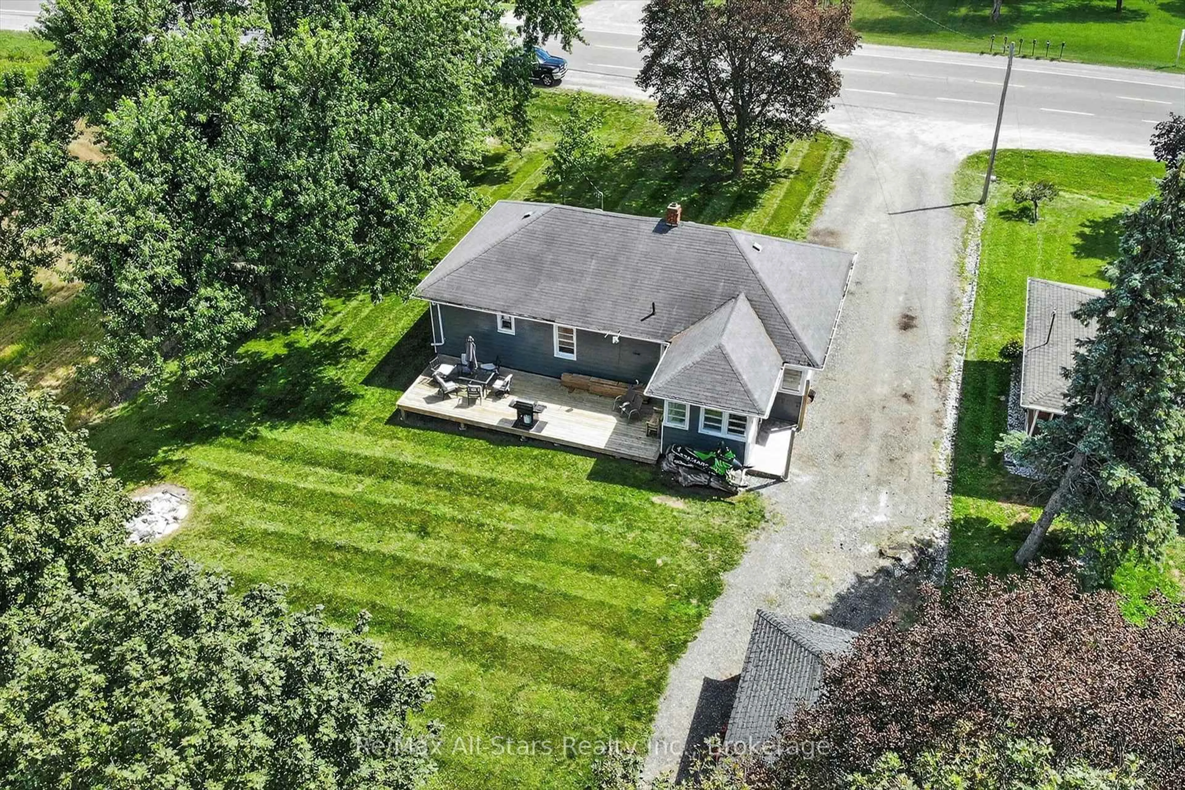 A pic from outside/outdoor area/front of a property/back of a property/a pic from drone, street for 981 Highway 7, Kawartha Lakes Ontario K0M 2M0