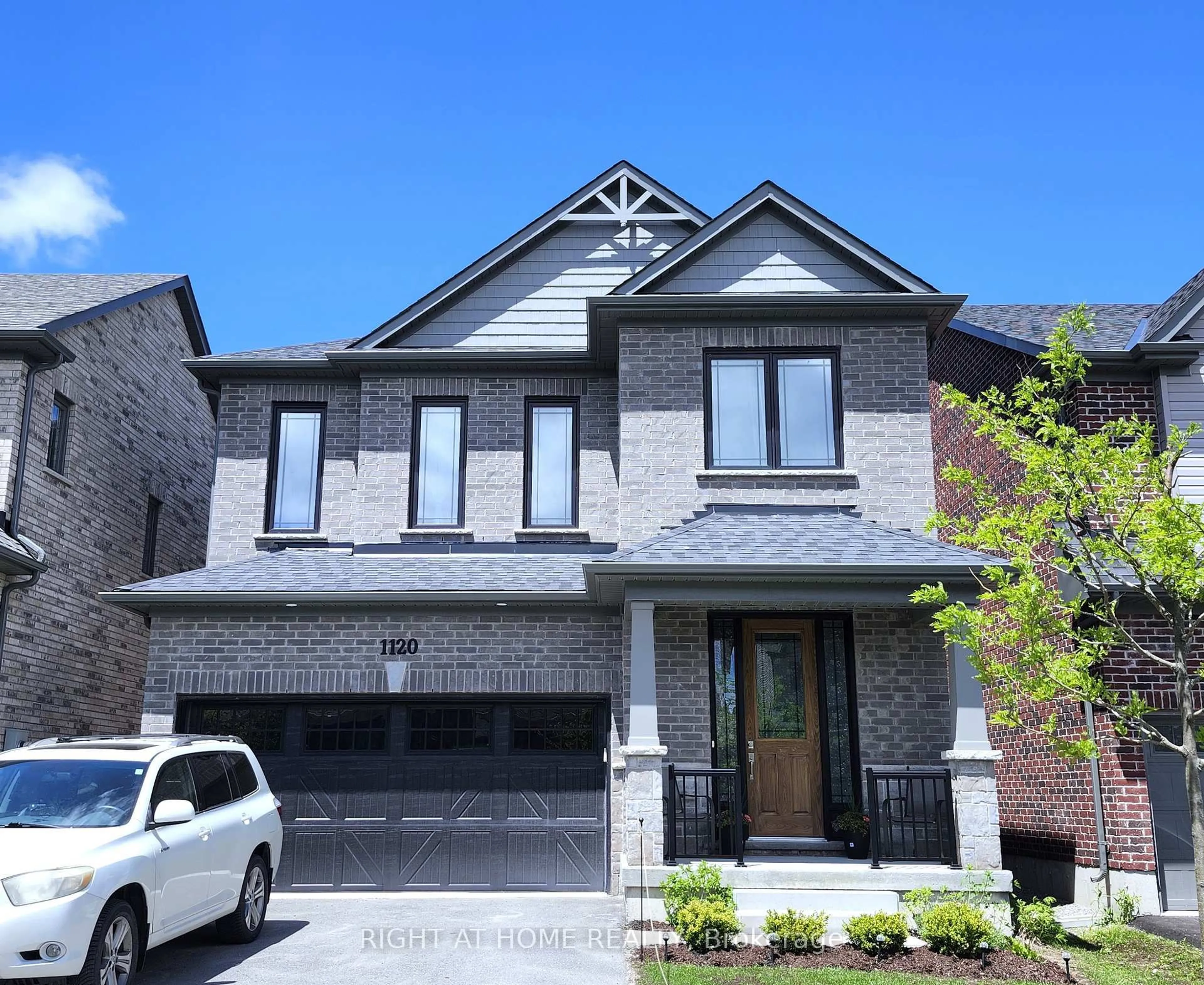 Home with brick exterior material, street for 1120 Rippingale Tr, Peterborough Ontario K9H 0K1