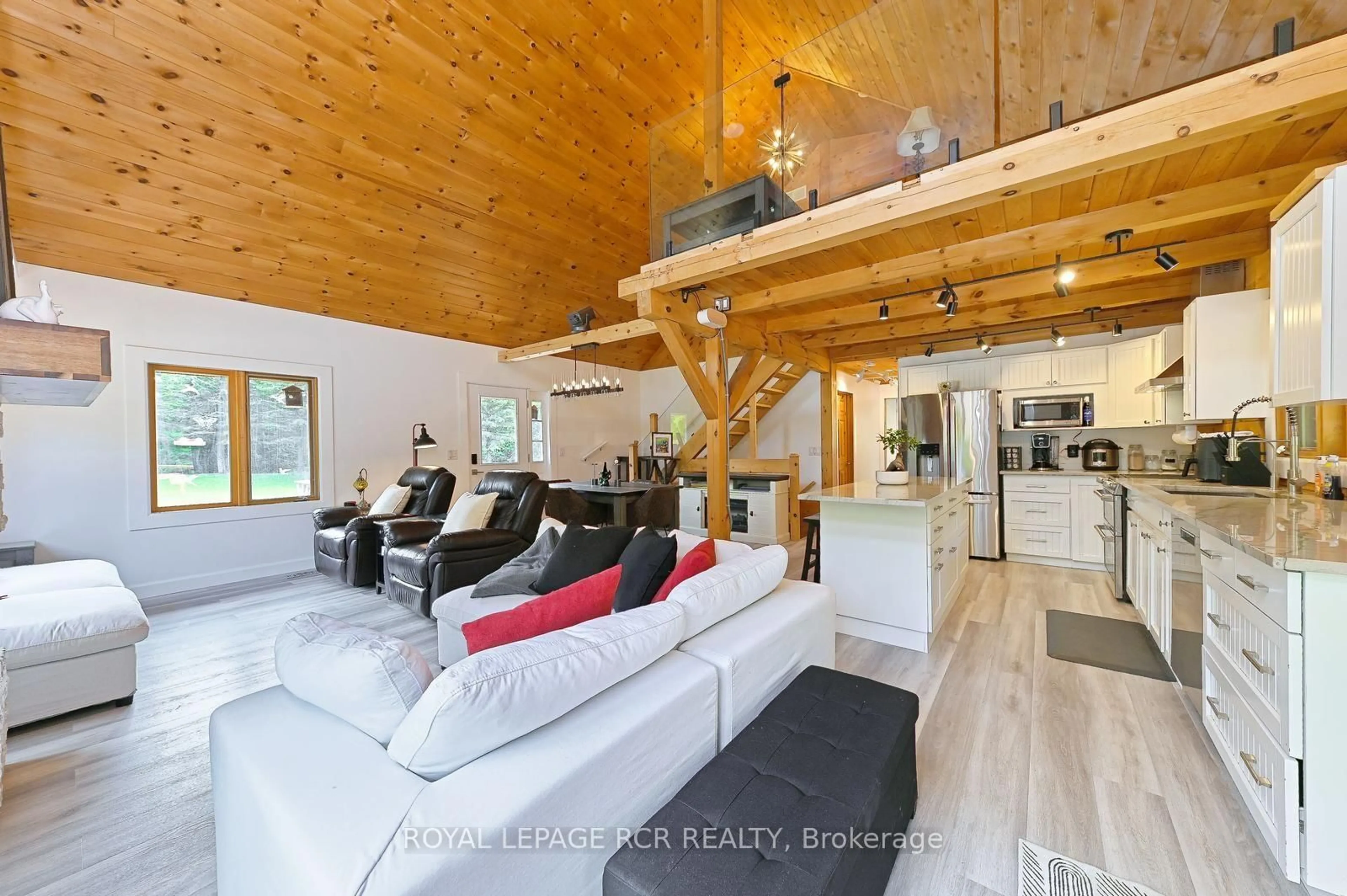 Living room with furniture, wood/laminate floor for 349805 4th Concession B Concession, Grey Highlands Ontario N0C 1M0