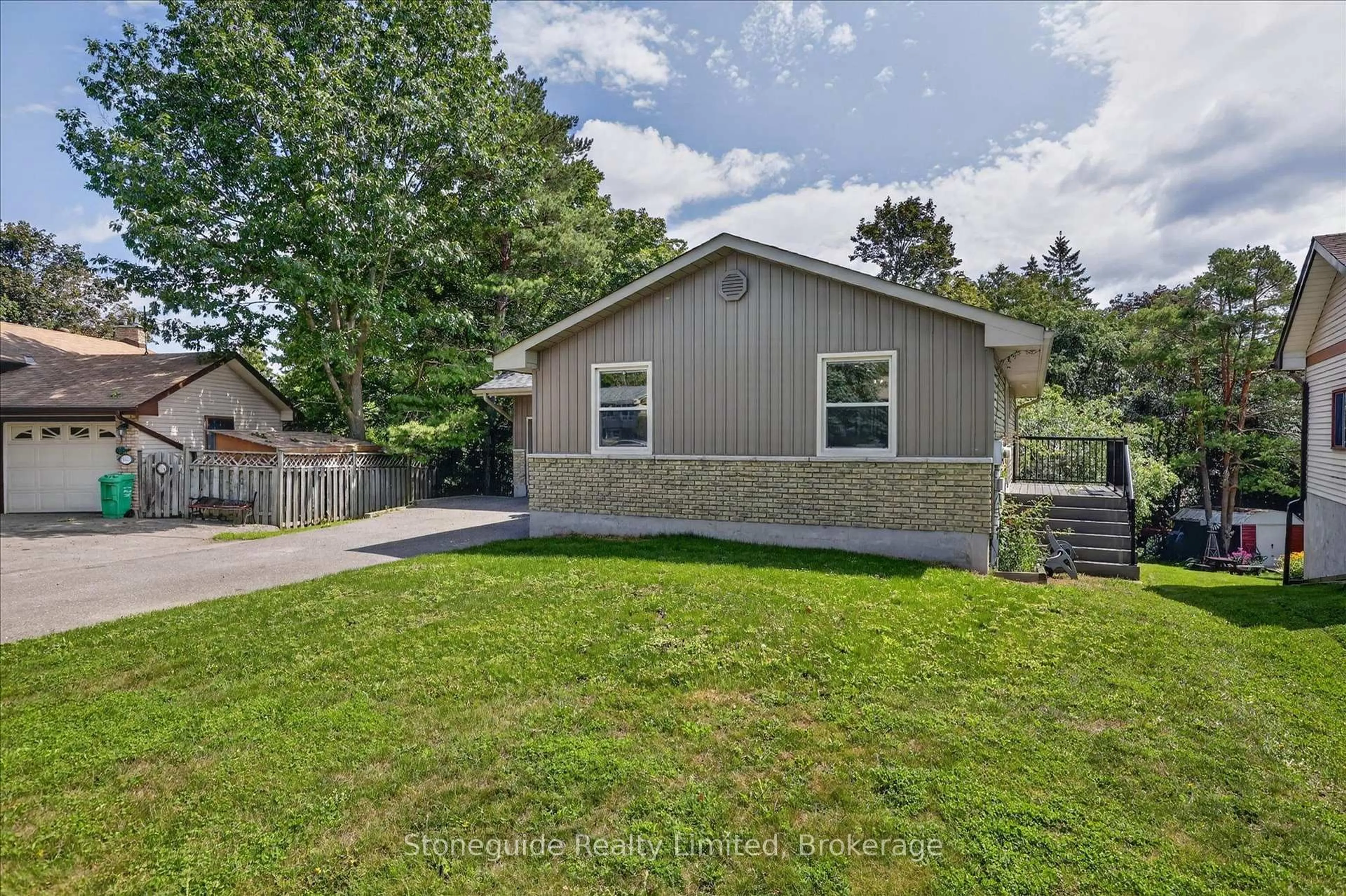 Home with vinyl exterior material, street for 1261 Pulpit Rd, Peterborough Ontario K9K 1H4