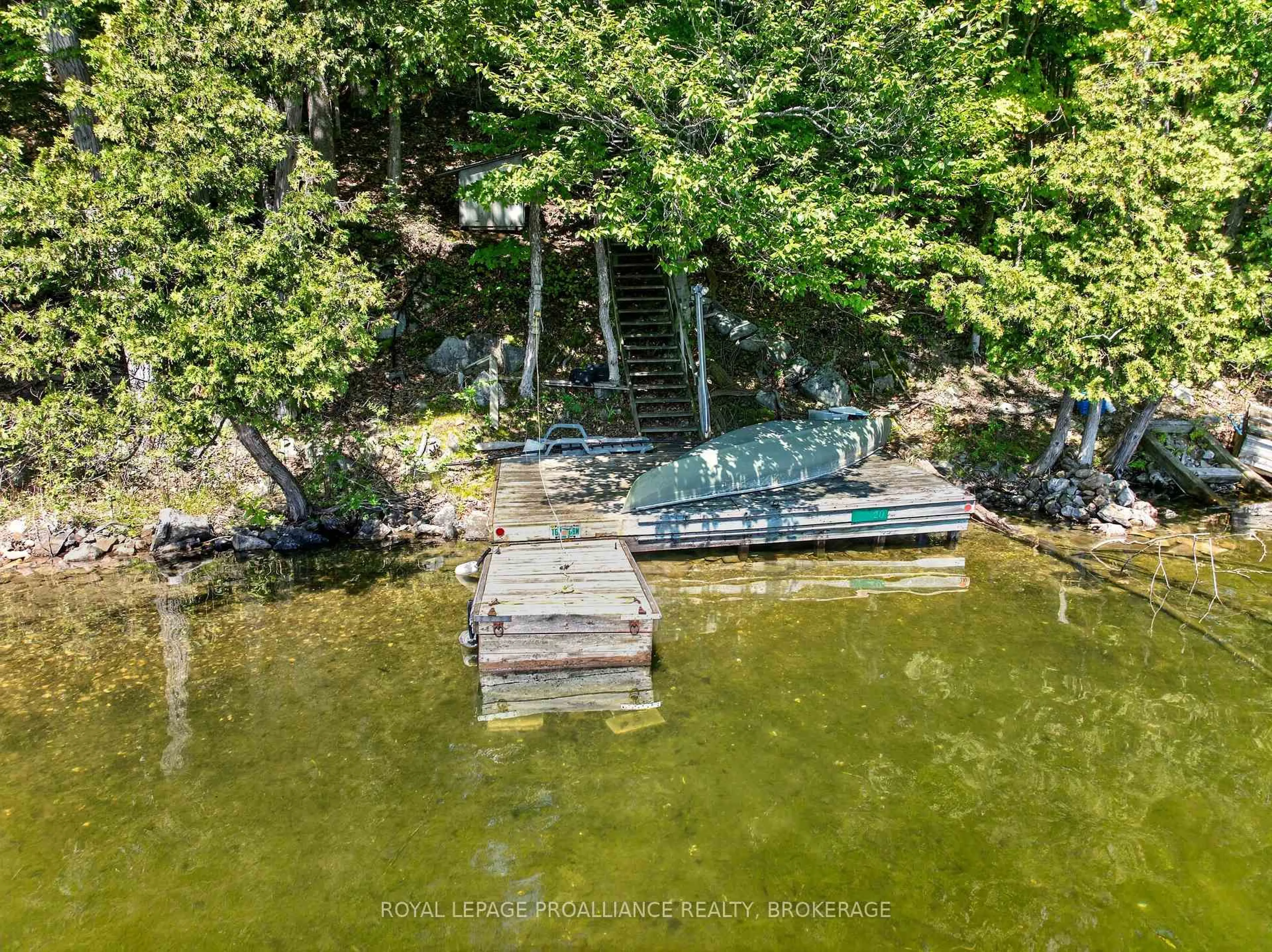 A pic from outside/outdoor area/front of a property/back of a property/a pic from drone, water/lake/river/ocean view for 20 Porcupine Island, Perth Road Ontario K0H 2L0
