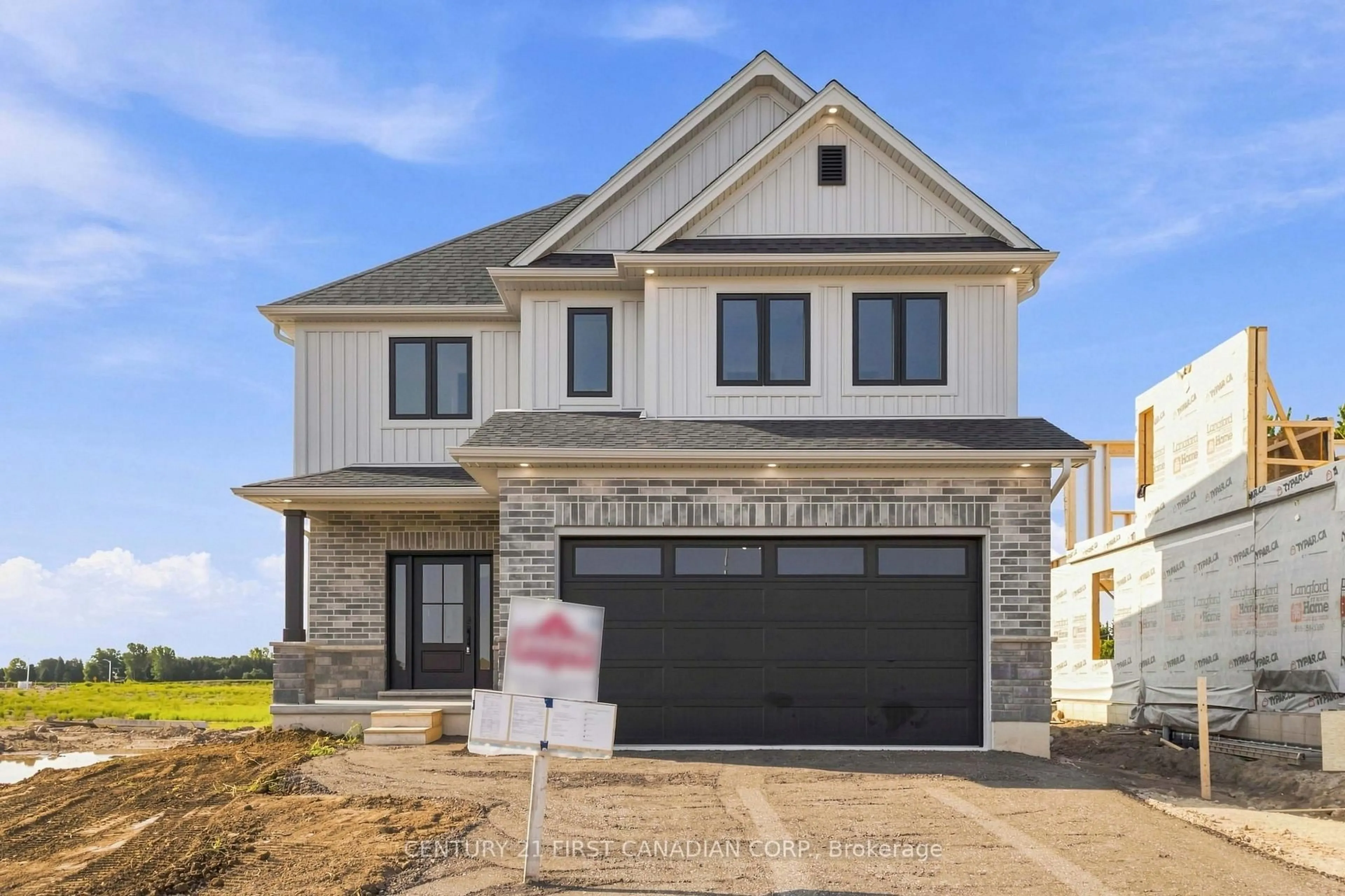 Home with brick exterior material, street for 115 Addison Ave, Lucan Biddulph Ontario N0M 2J0