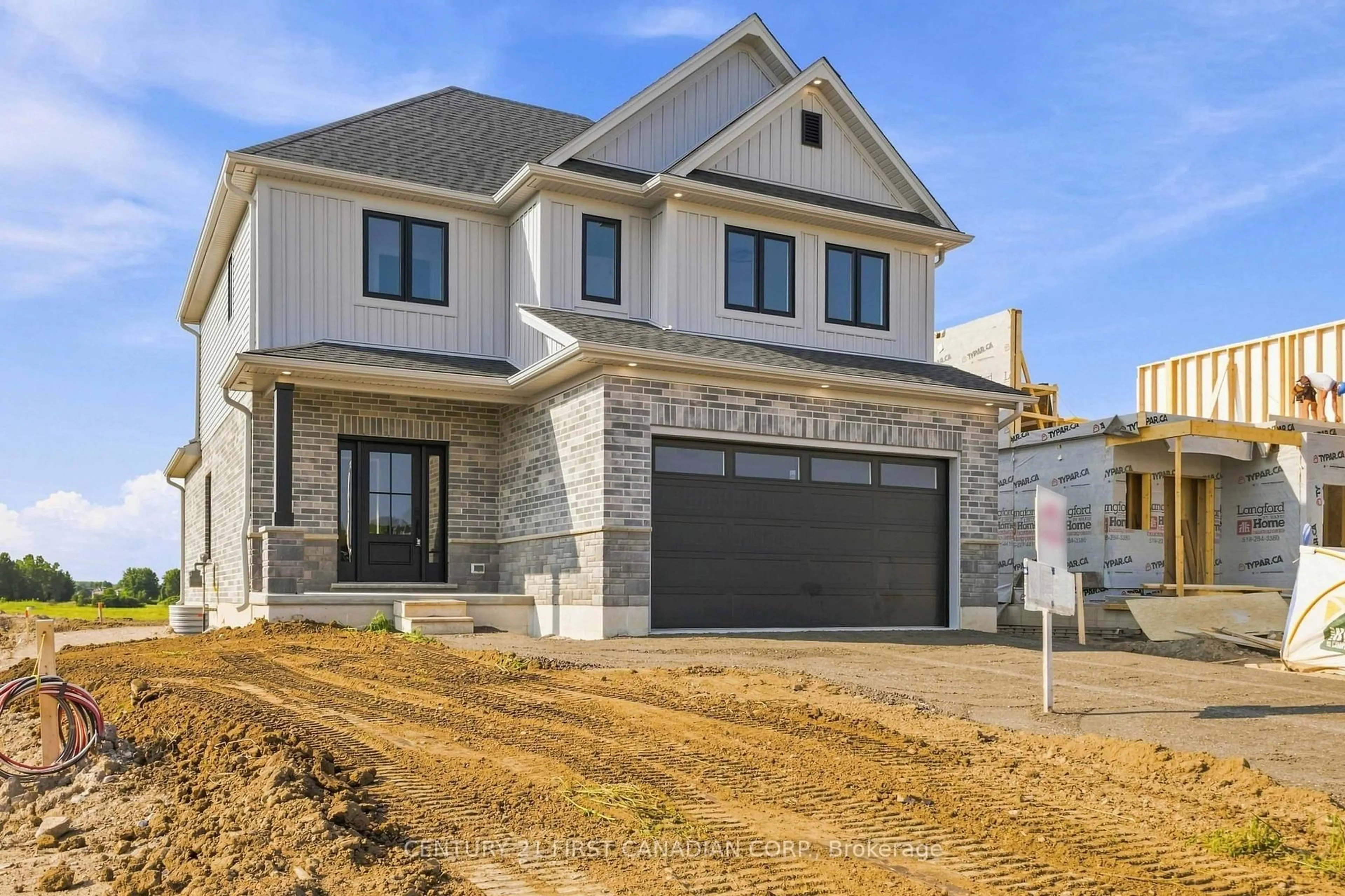 Home with brick exterior material, street for 115 Addison Ave, Lucan Biddulph Ontario N0M 2J0