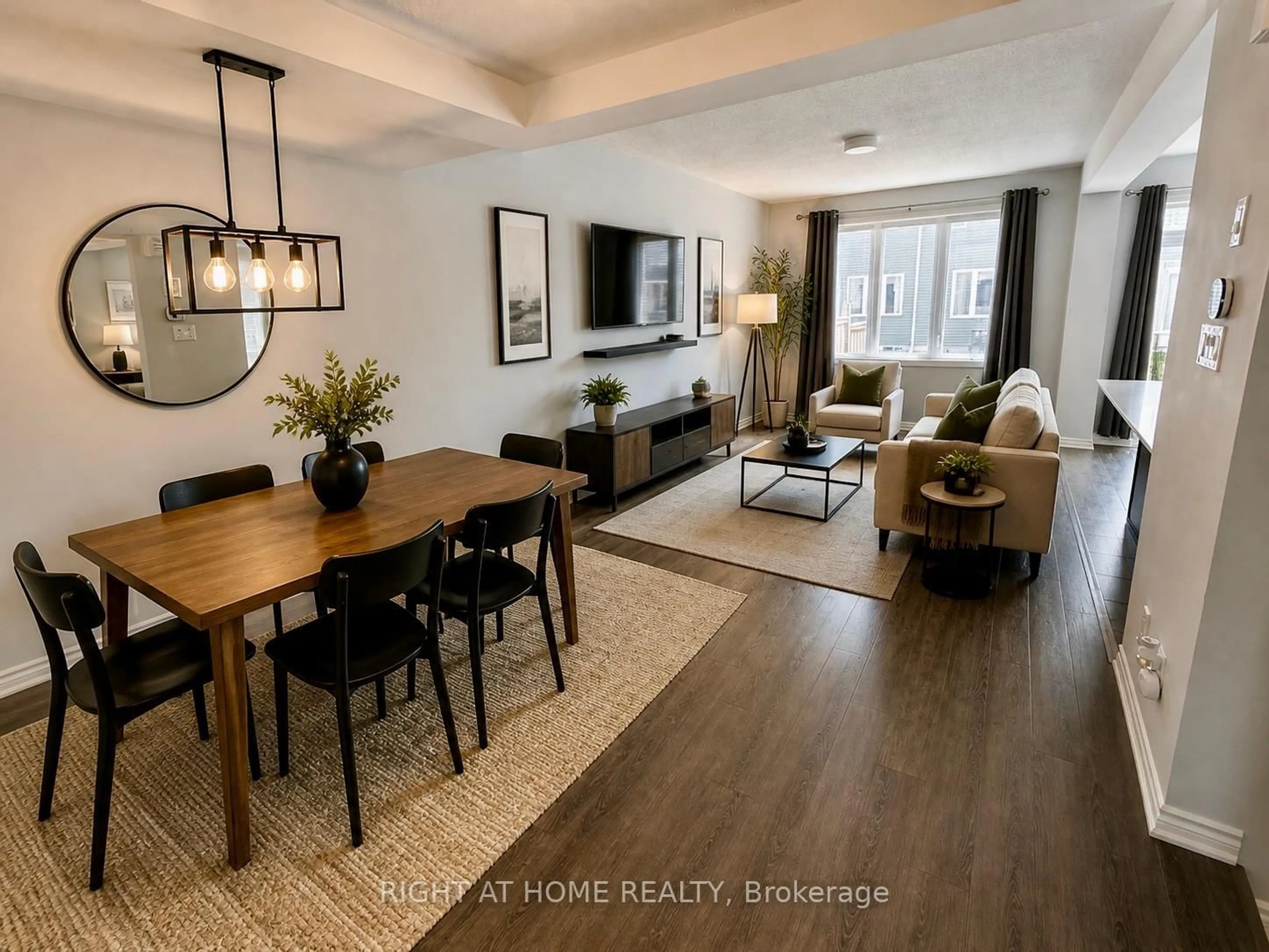 Living room with furniture, wood/laminate floor for 709 Derreen Ave, Stittsville Ontario K2S 2Z2