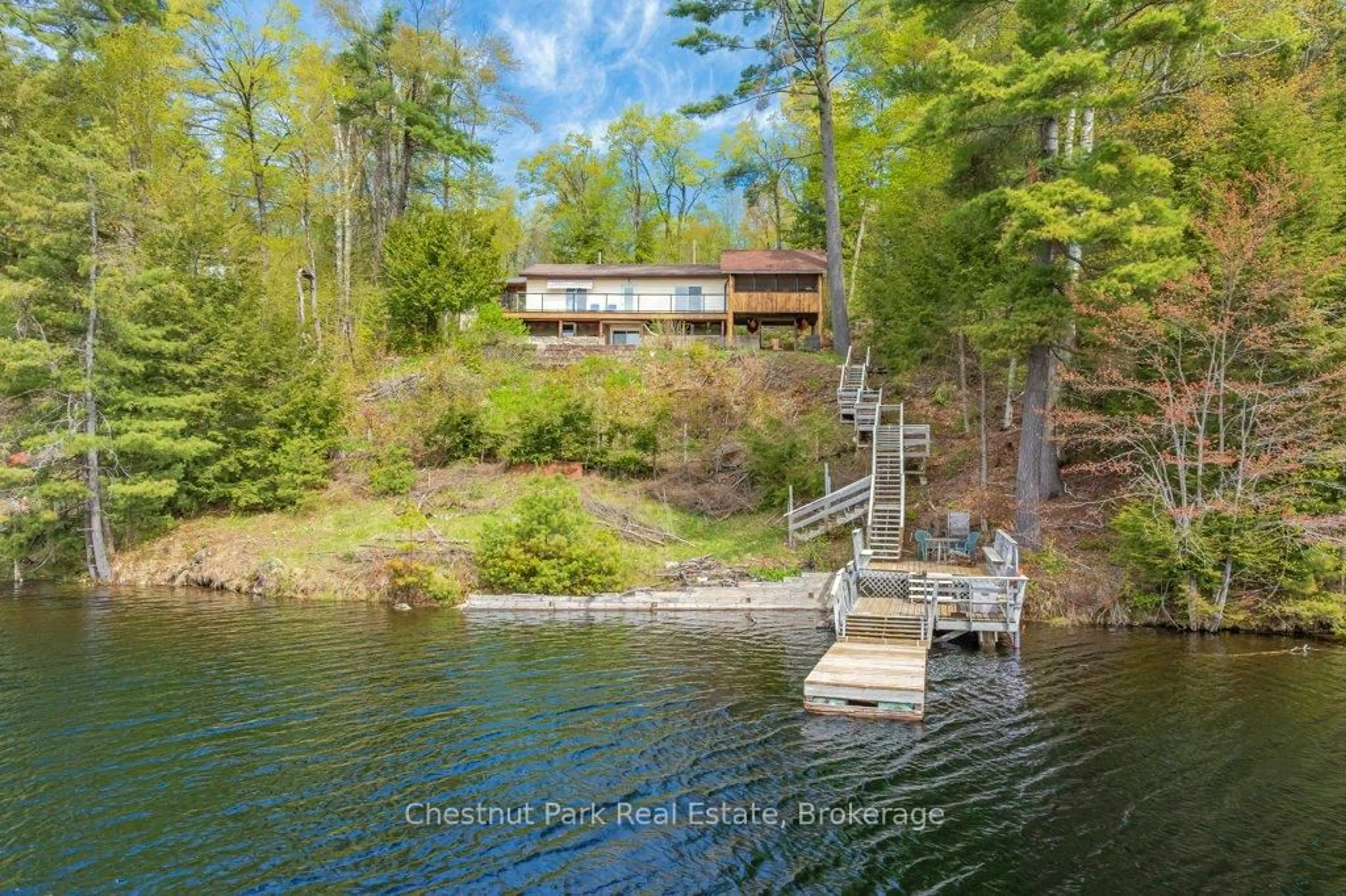 A pic from outside/outdoor area/front of a property/back of a property/a pic from drone, water/lake/river/ocean view for 1026 Carlson Pl, Bracebridge Ontario P1L 1X1