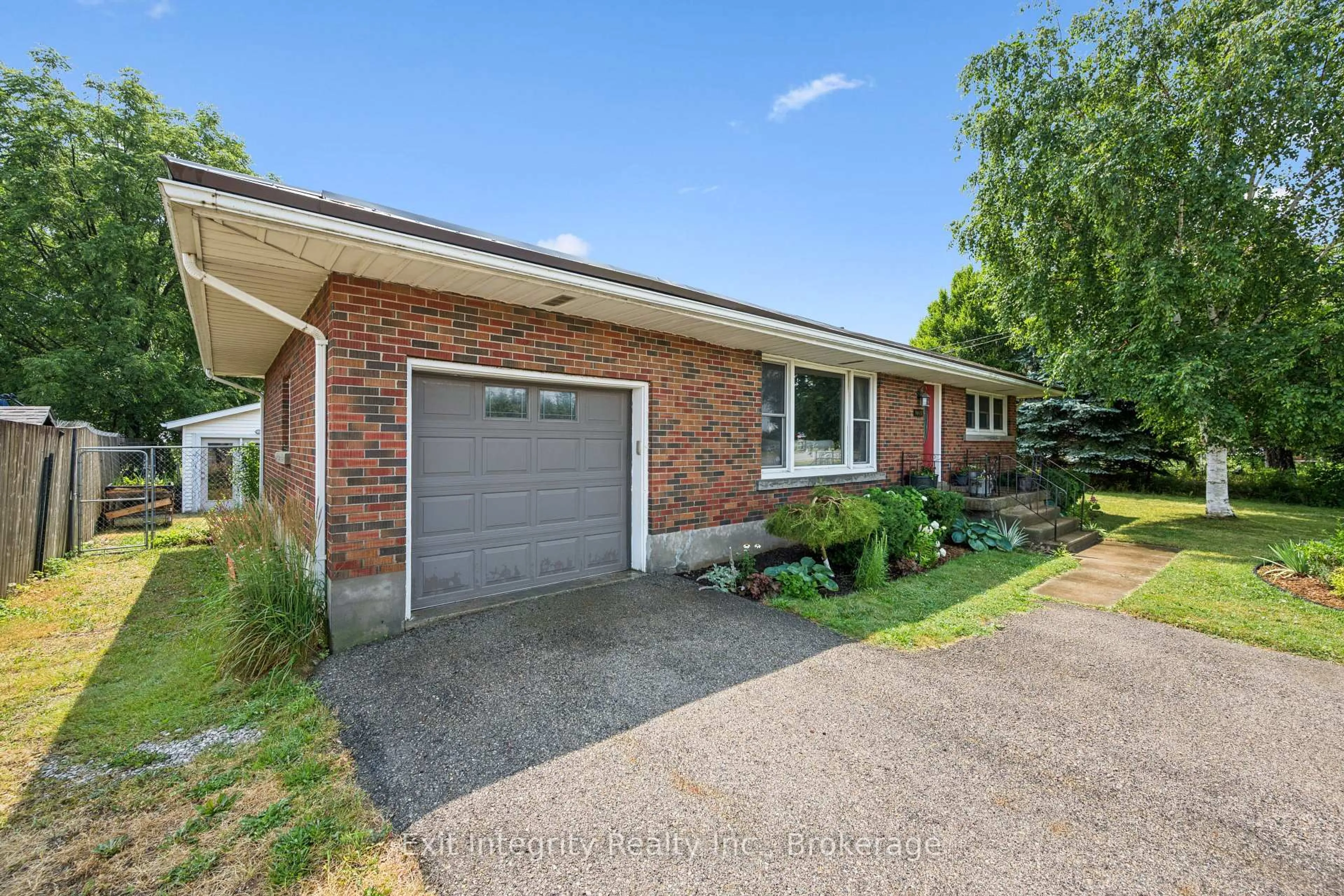 Home with brick exterior material, street for 1065 Erie St, Stratford Ontario N5A 6S4