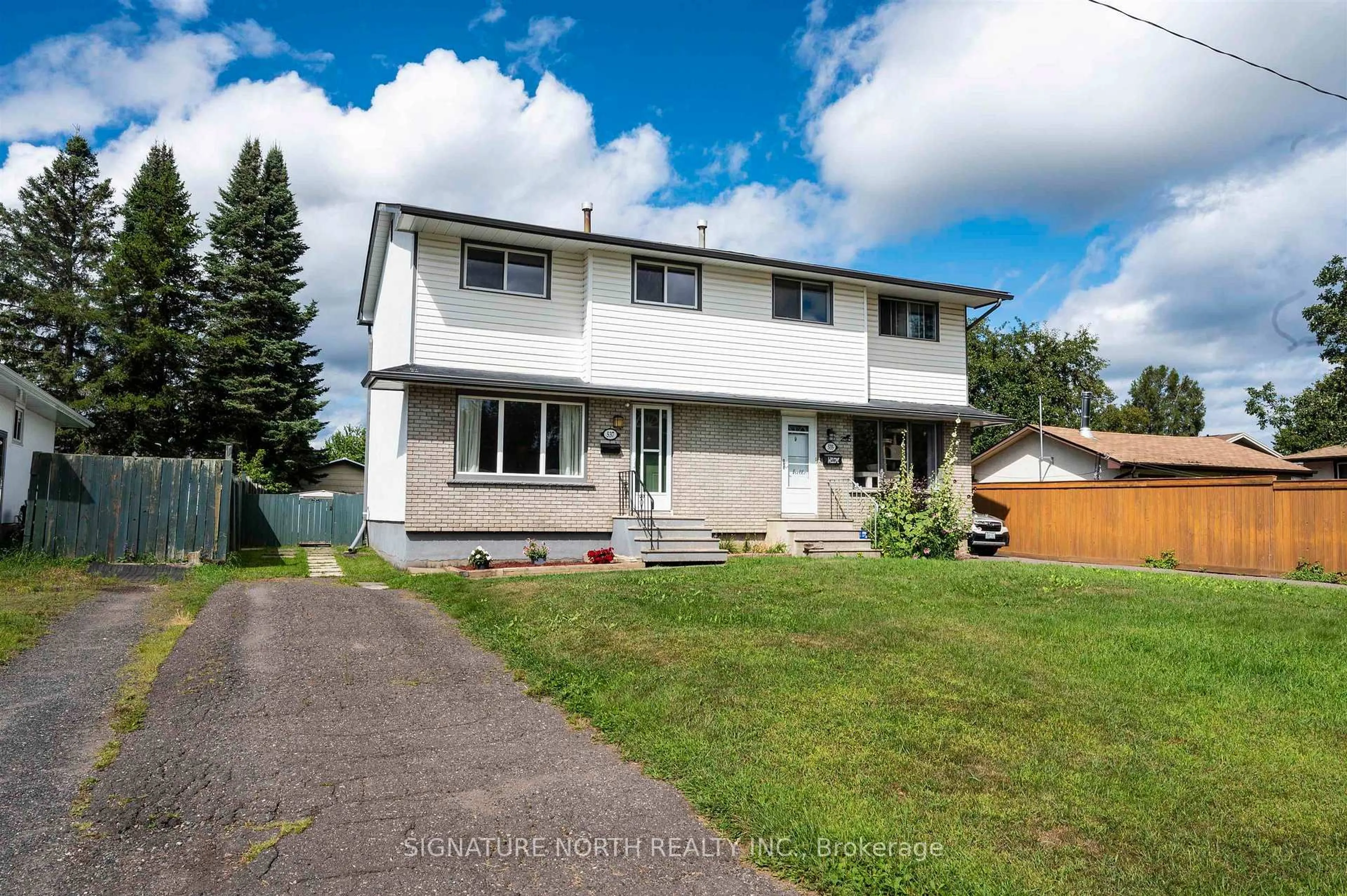 Home with vinyl exterior material, street for 537 Churchill Drive West, Thunder Bay Ontario P7C 5C4