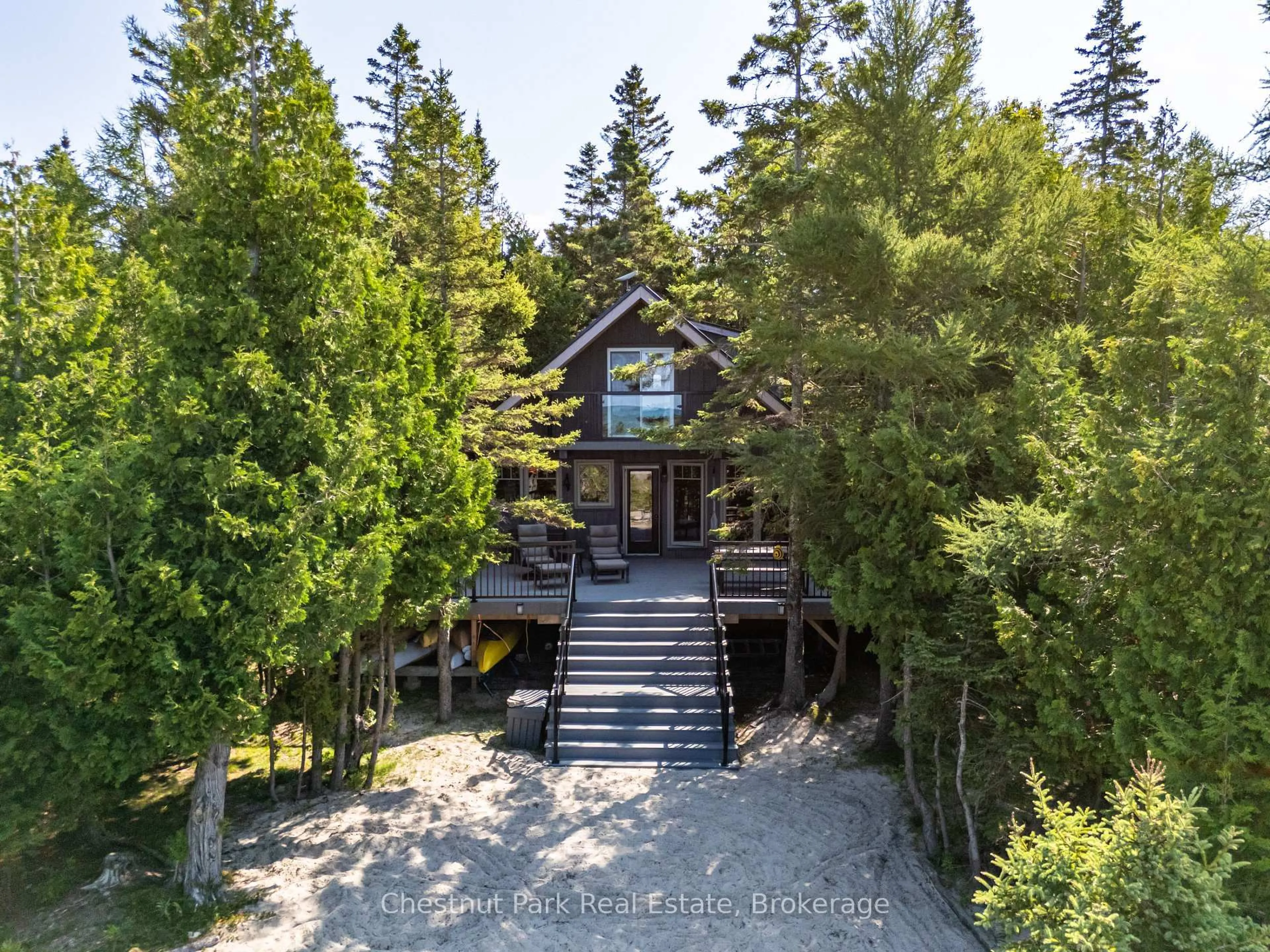 A pic from outside/outdoor area/front of a property/back of a property/a pic from drone, forest/trees view for 100 Forbes Rd, Northern Bruce Peninsula Ontario N0H 2T0