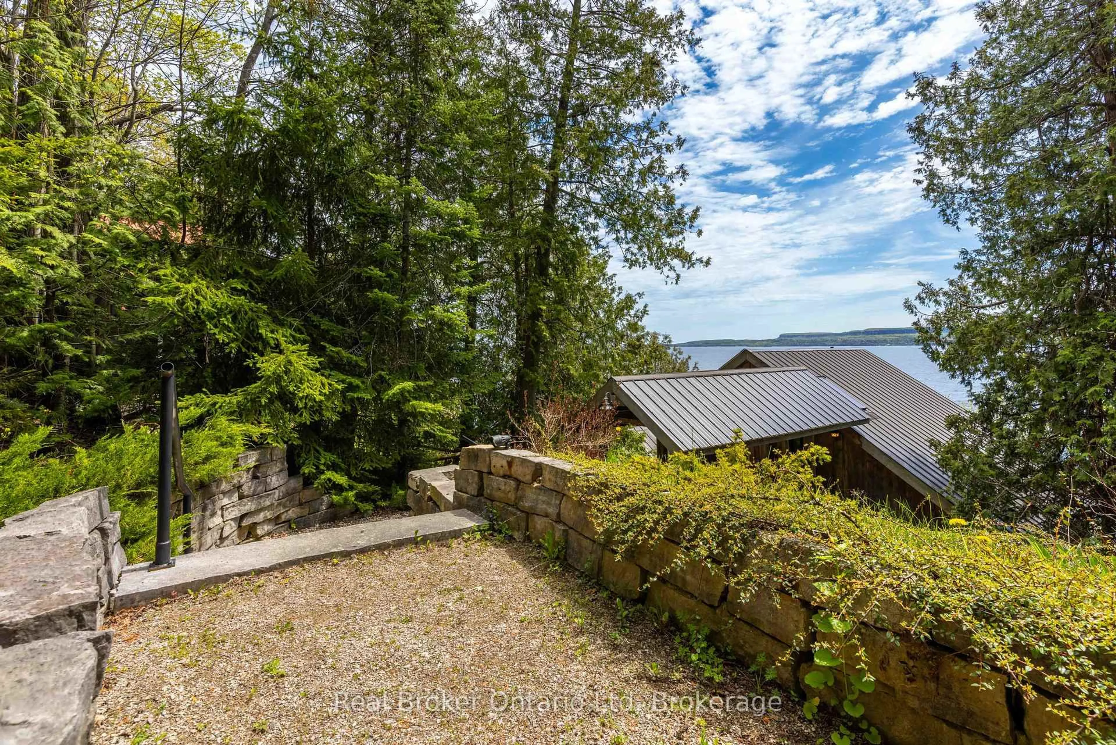 A pic from outside/outdoor area/front of a property/back of a property/a pic from drone, unknown for 574 Mallory Beach Rd, South Bruce Peninsula Ontario N0H 2T0