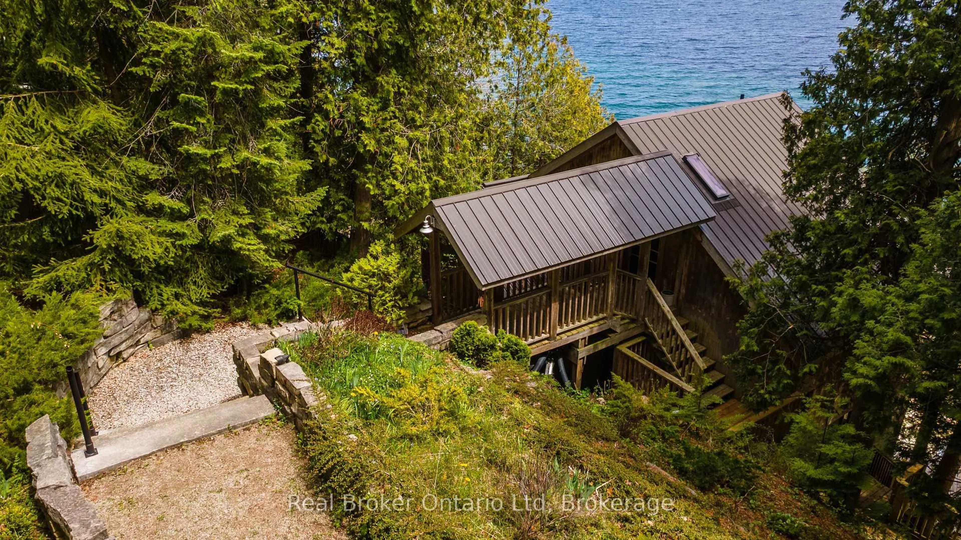 A pic from outside/outdoor area/front of a property/back of a property/a pic from drone, water/lake/river/ocean view for 574 Mallory Beach Rd, South Bruce Peninsula Ontario N0H 2T0