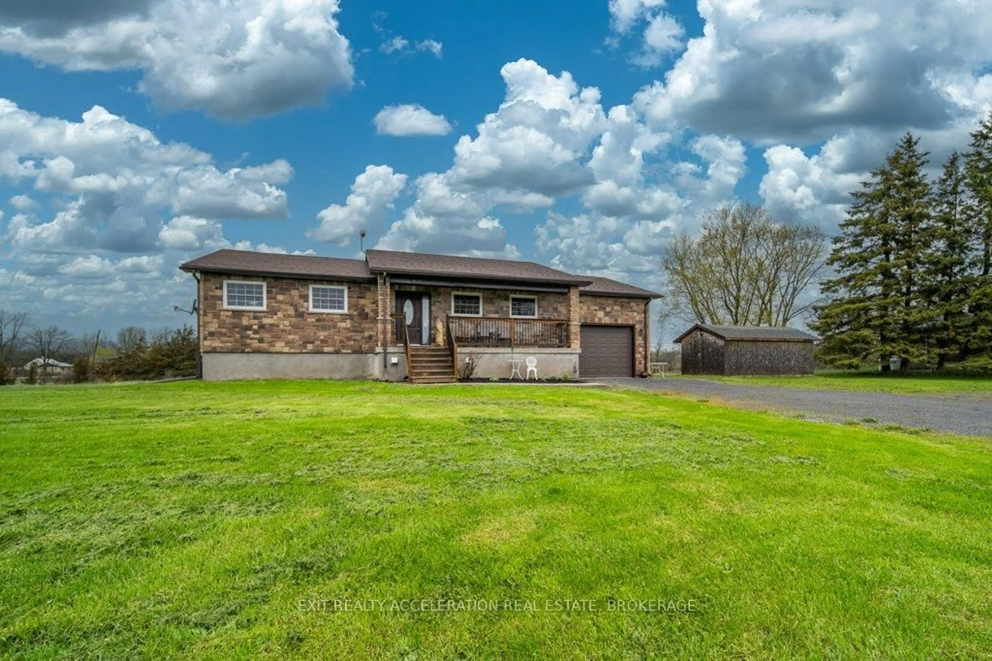 A pic from outside/outdoor area/front of a property/back of a property/a pic from drone, water/lake/river/ocean view for 4314 County Rd 8, Napanee Ontario K7R 3K7