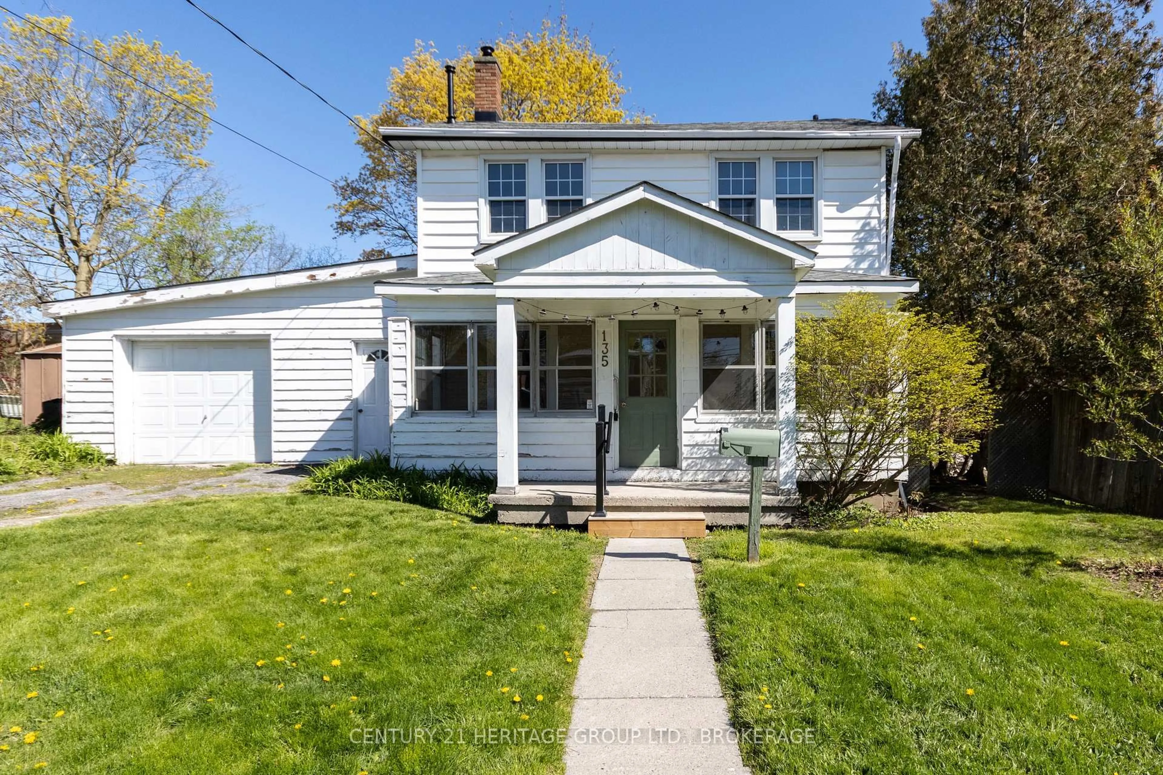 Home with vinyl exterior material, street for 135 James St, Kingston Ontario K7K 1Z5
