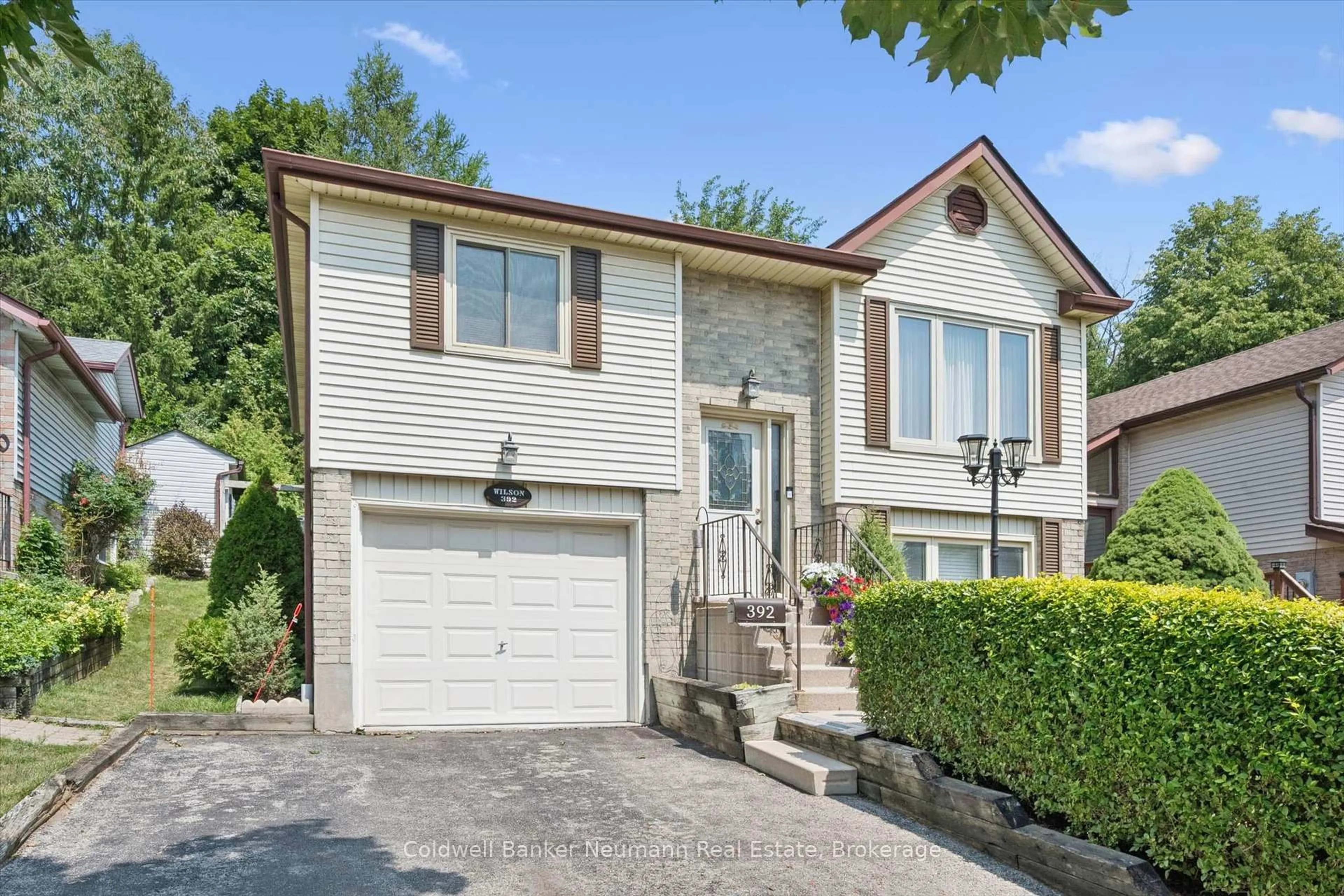 Home with vinyl exterior material, street for 392 Imperial Rd, Guelph Ontario N1K 1K3