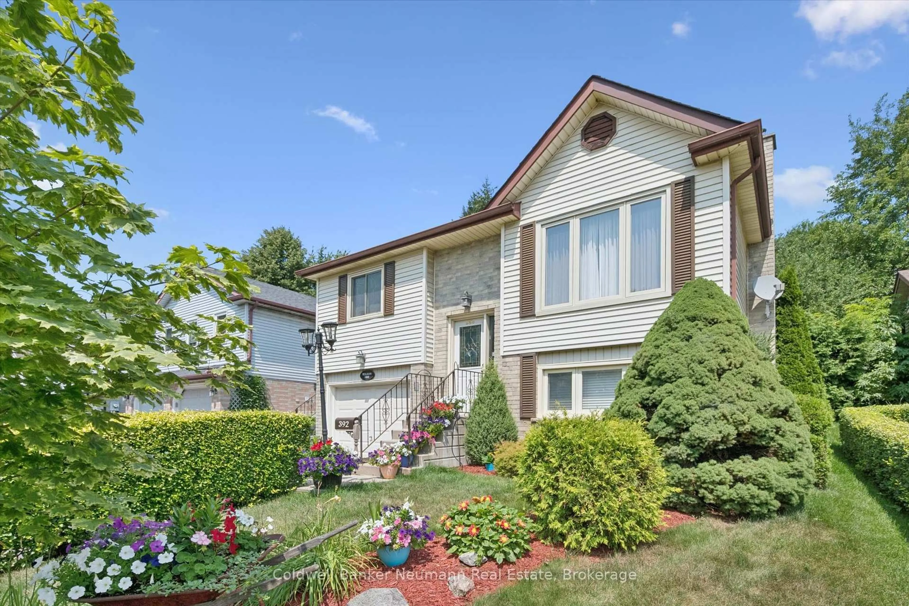 Home with vinyl exterior material, street for 392 Imperial Rd, Guelph Ontario N1K 1K3