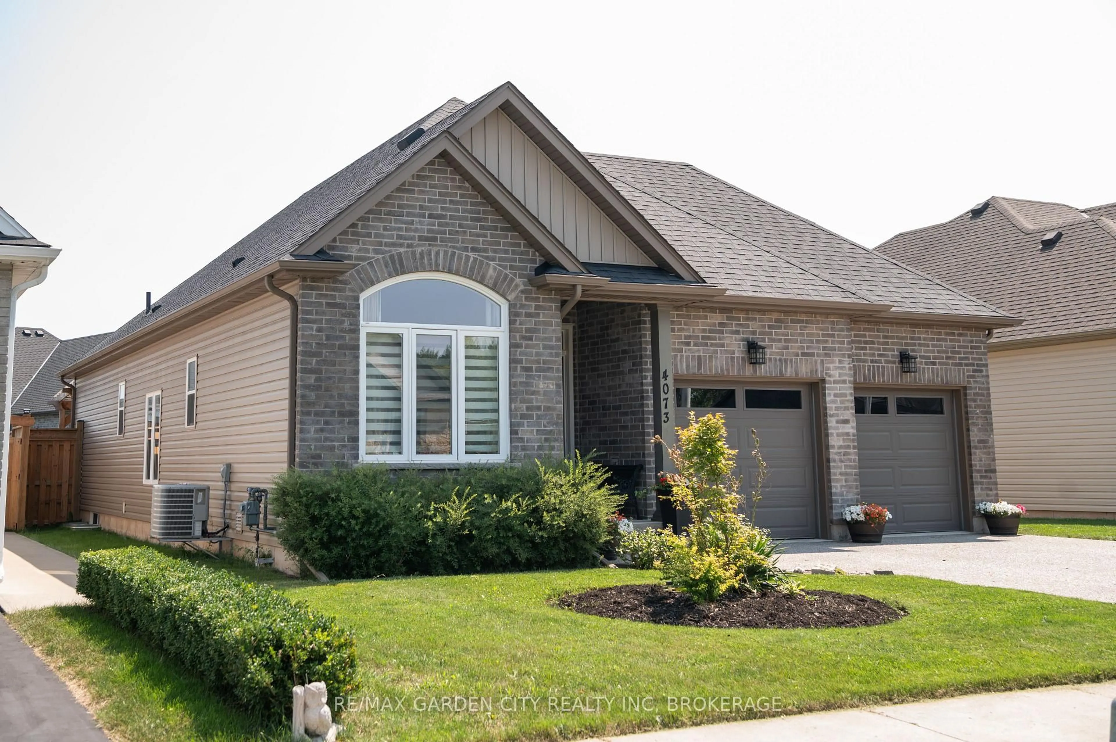 Home with brick exterior material, street for 4073 Village Creek Dr, Fort Erie Ontario L0S 1S0