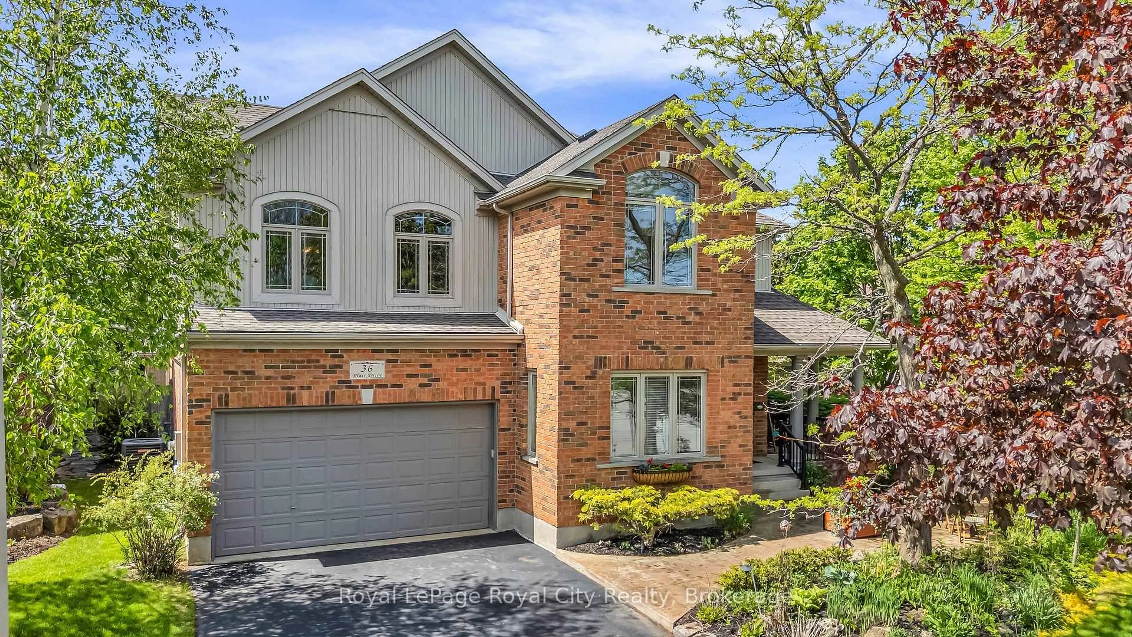 Home with brick exterior material, street for 36 Blair Dr, Guelph Ontario N1L 1N7