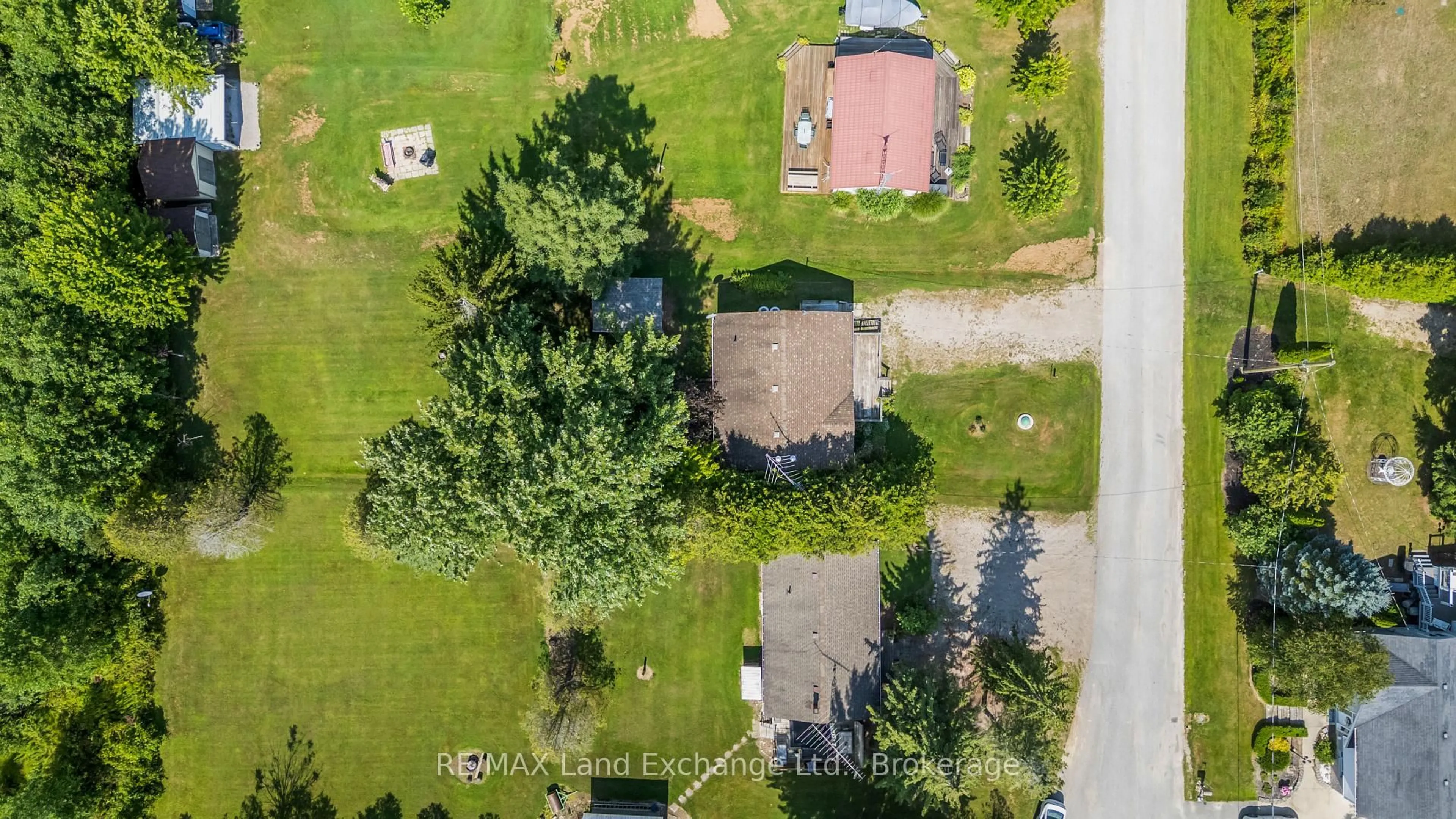 A pic from outside/outdoor area/front of a property/back of a property/a pic from drone, street for 46 Lilac Lane, South Bruce Peninsula Ontario N0H 1A0
