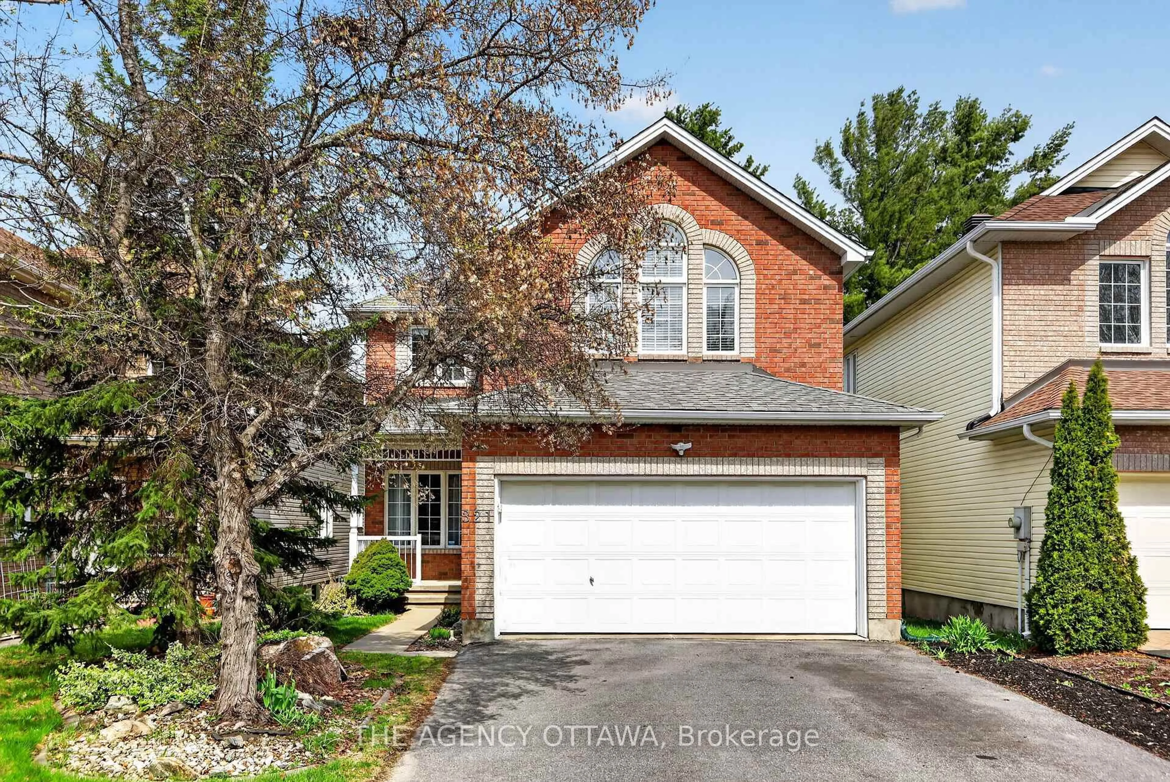 Home with brick exterior material, street for 321 Goldridge Dr, Kanata Ontario K2T 1G8