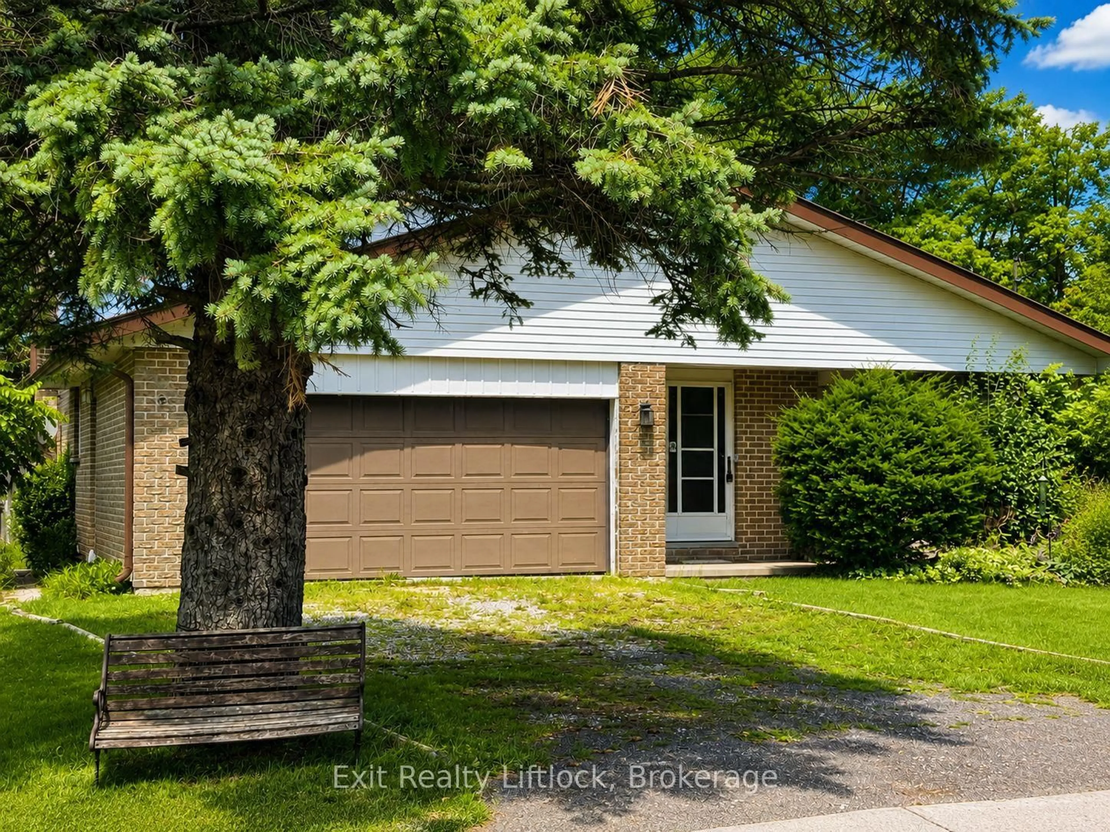 Home with vinyl exterior material, street for 2 Frederick St, Cavan Monaghan Ontario L0A 1G0
