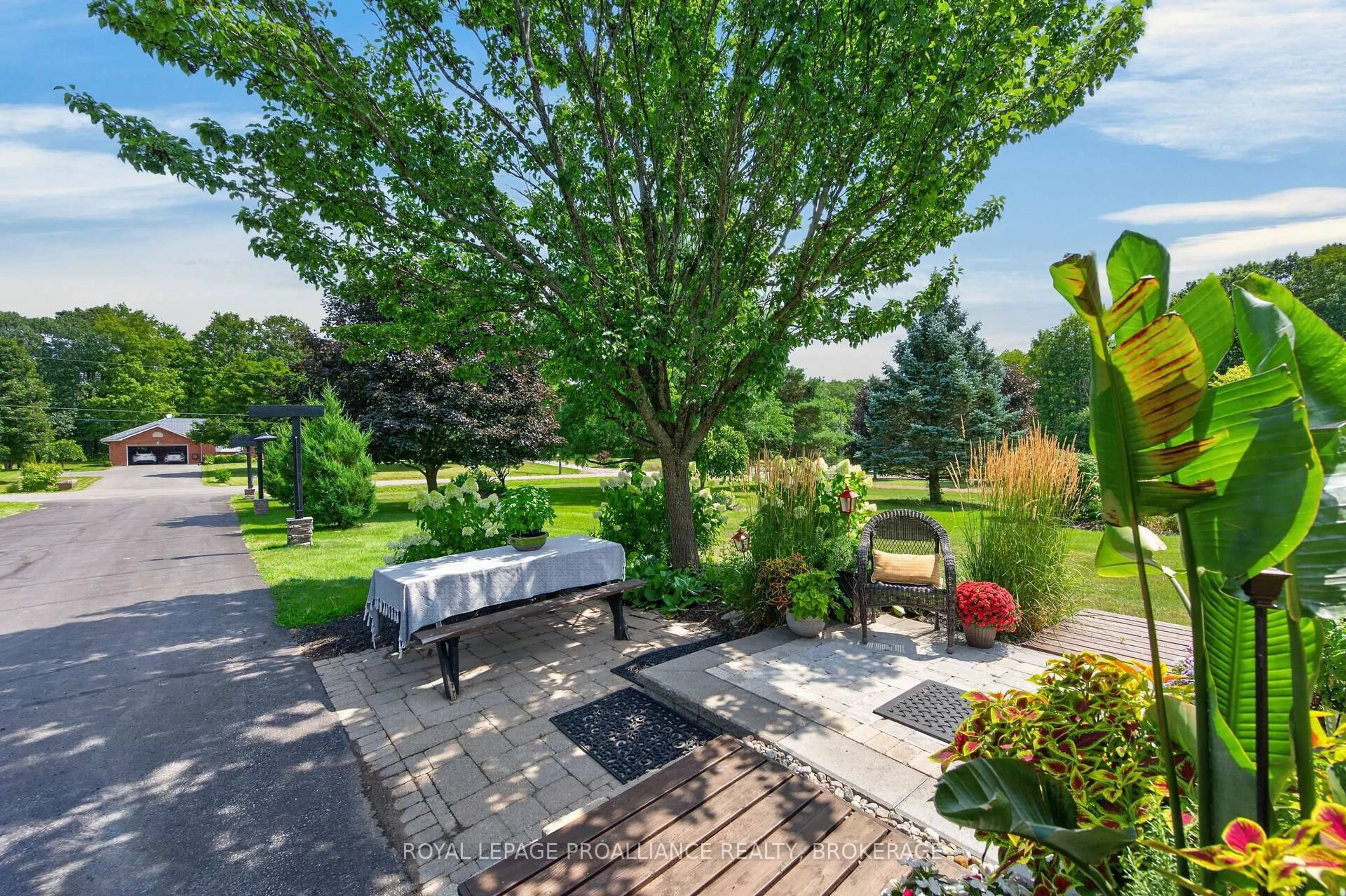A pic from outside/outdoor area/front of a property/back of a property/a pic from drone, forest/trees view for 3335 Four Seasons Dr, Inverary Ontario K0H 1X0