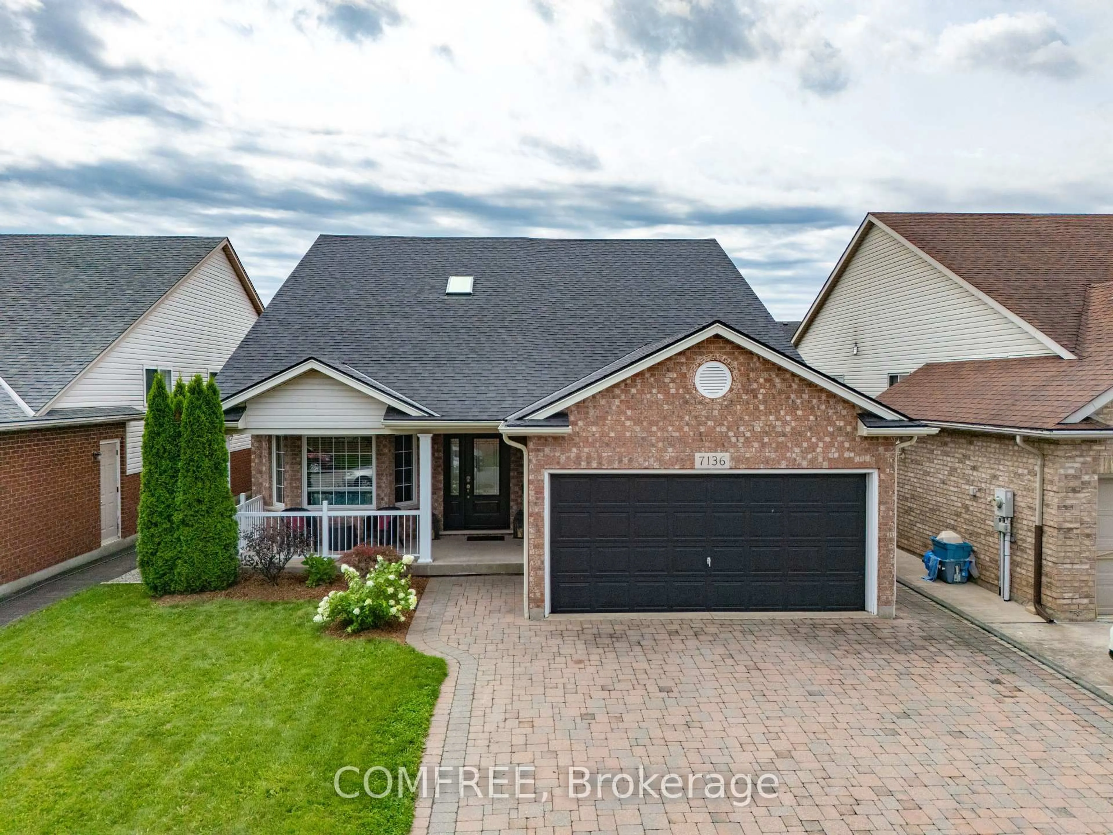 Home with brick exterior material, street for 7136 Julie Dr, Niagara Falls Ontario L2H 3L4