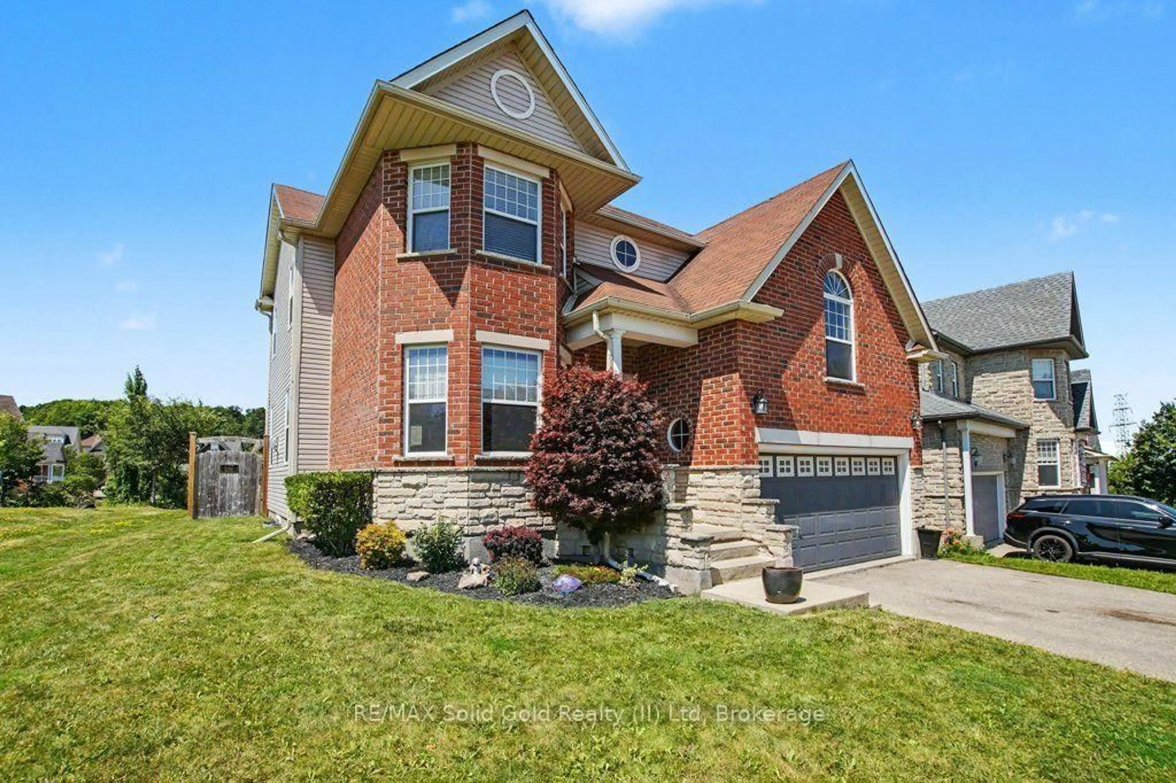 Home with brick exterior material, street for 767 Lucerne Ave, Waterloo Ontario N2T 2Y3