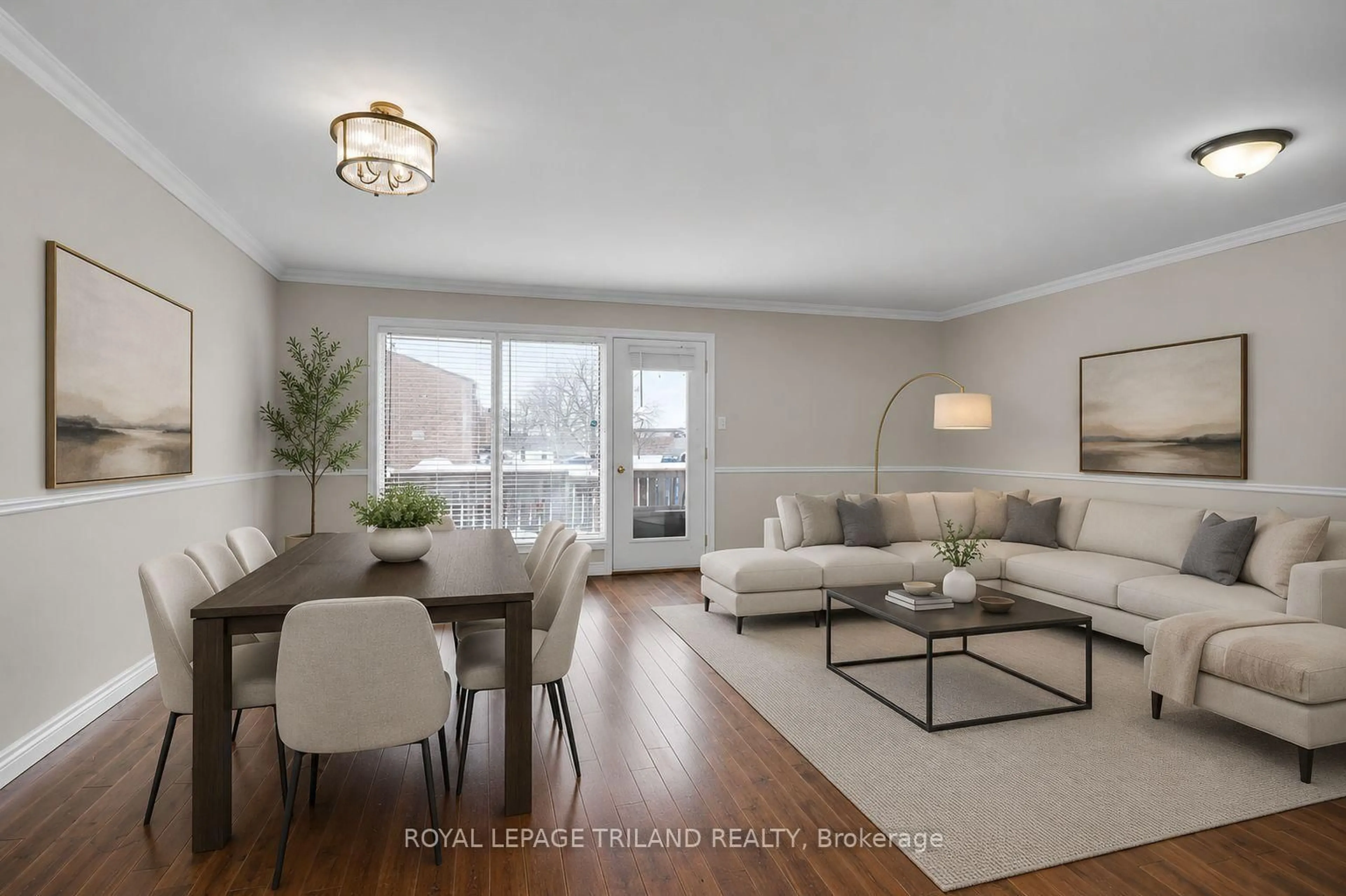 Living room with furniture, wood/laminate floor for 624 Wonderland Rd, London South Ontario N6H 4Y8