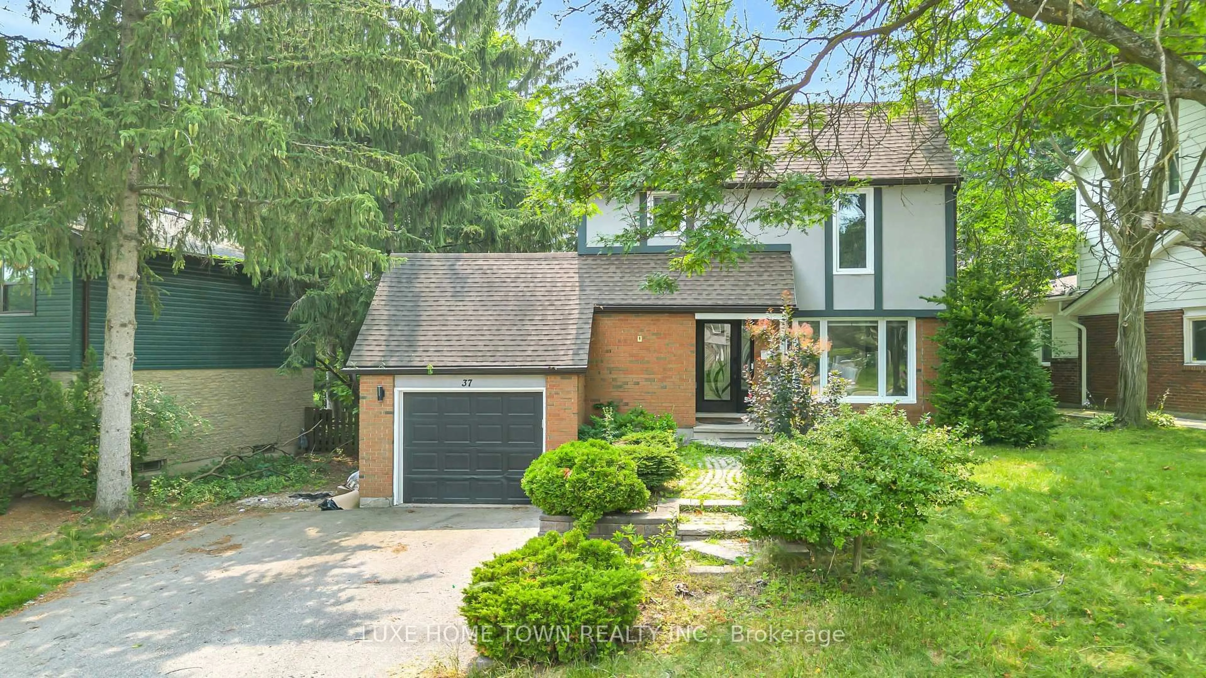 Home with brick exterior material, street for 37 Ferman Dr, Guelph Ontario N1H 7C9