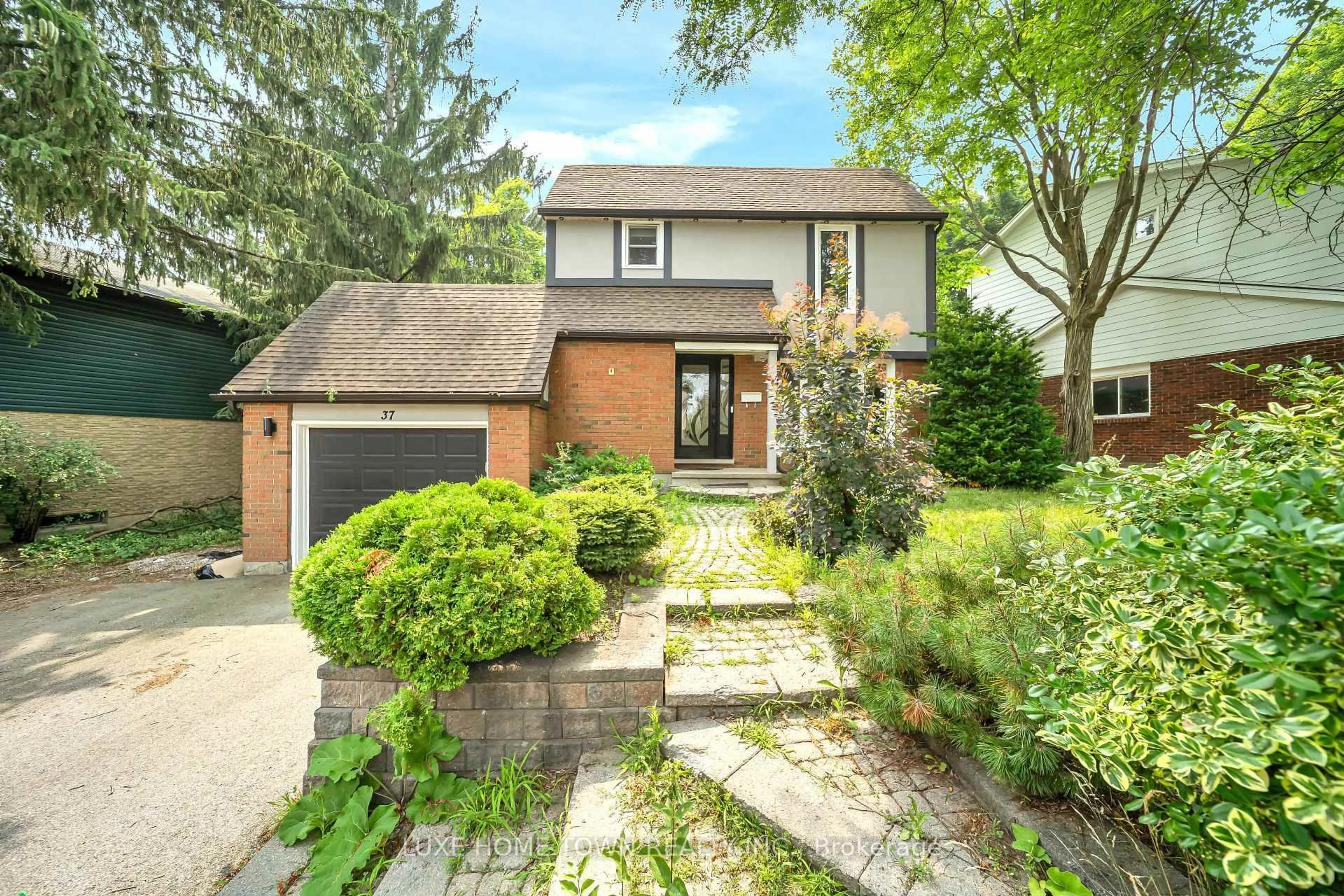 Home with brick exterior material, street for 37 Ferman Dr, Guelph Ontario N1H 7C9