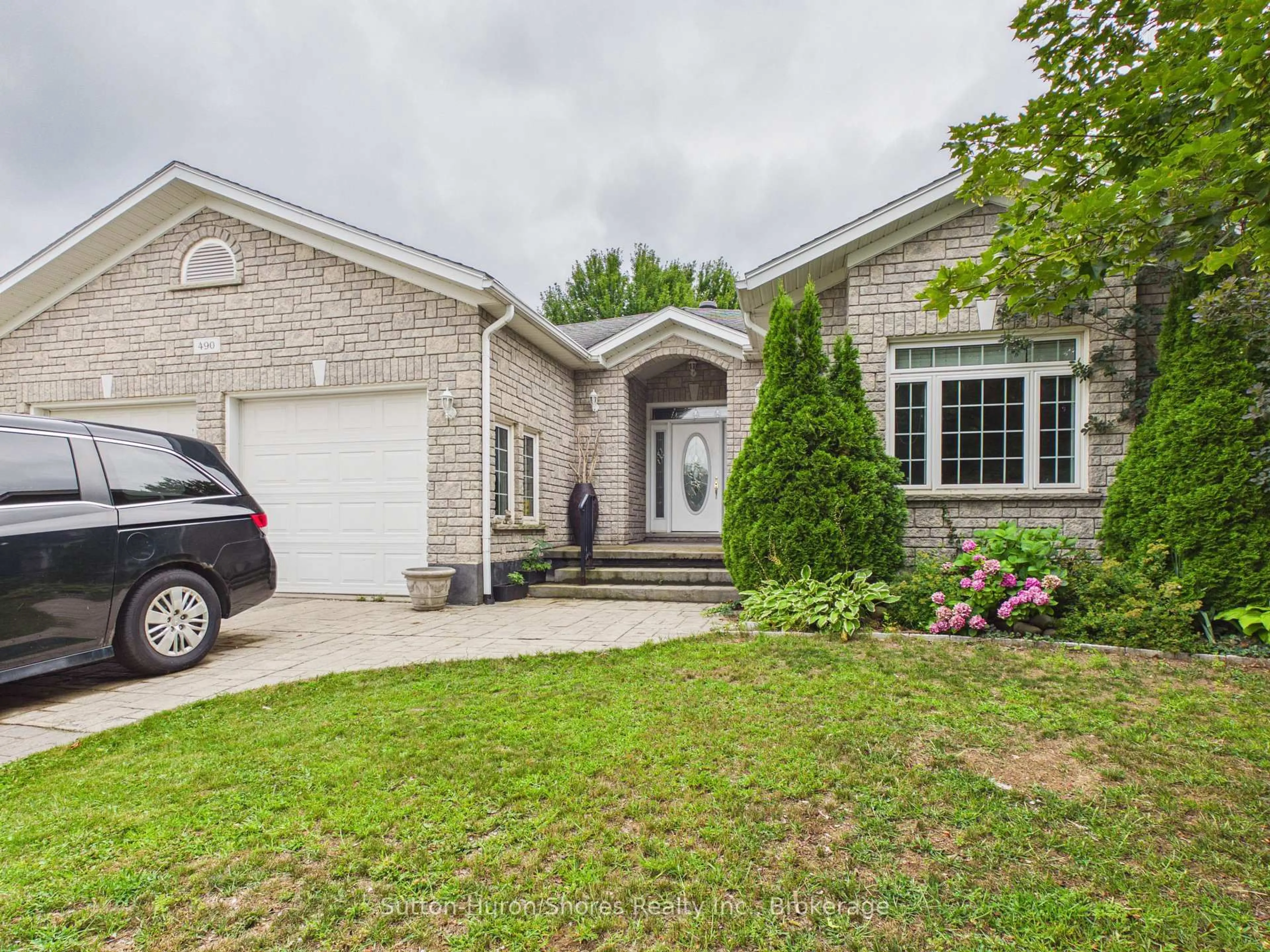 Home with brick exterior material, street for 490 Bluewater Dr, Saugeen Shores Ontario N0H 2C1