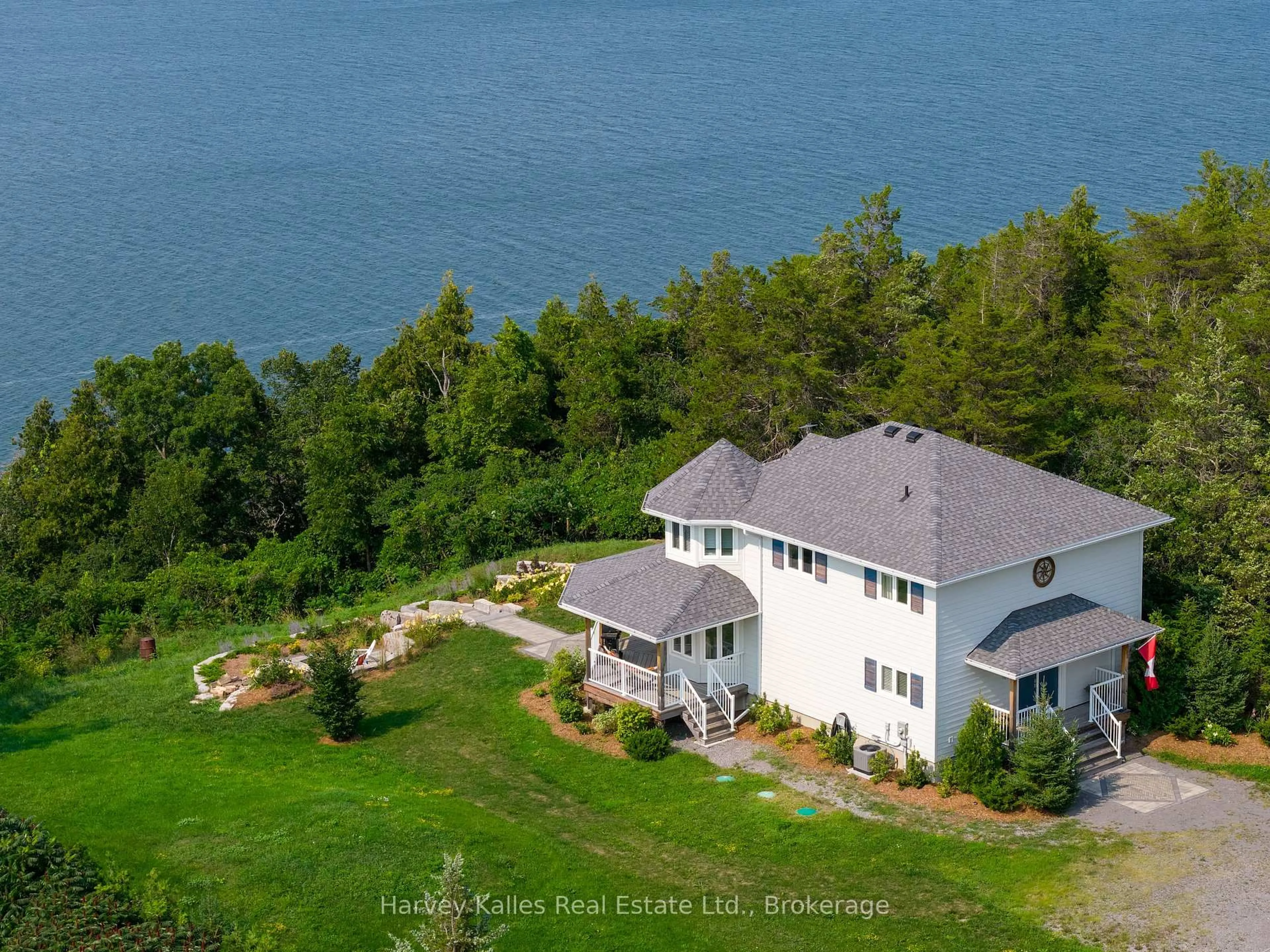 A pic from outside/outdoor area/front of a property/back of a property/a pic from drone, water/lake/river/ocean view for 2045 County Rd 7, Prince Edward County Ontario K0K 2T0