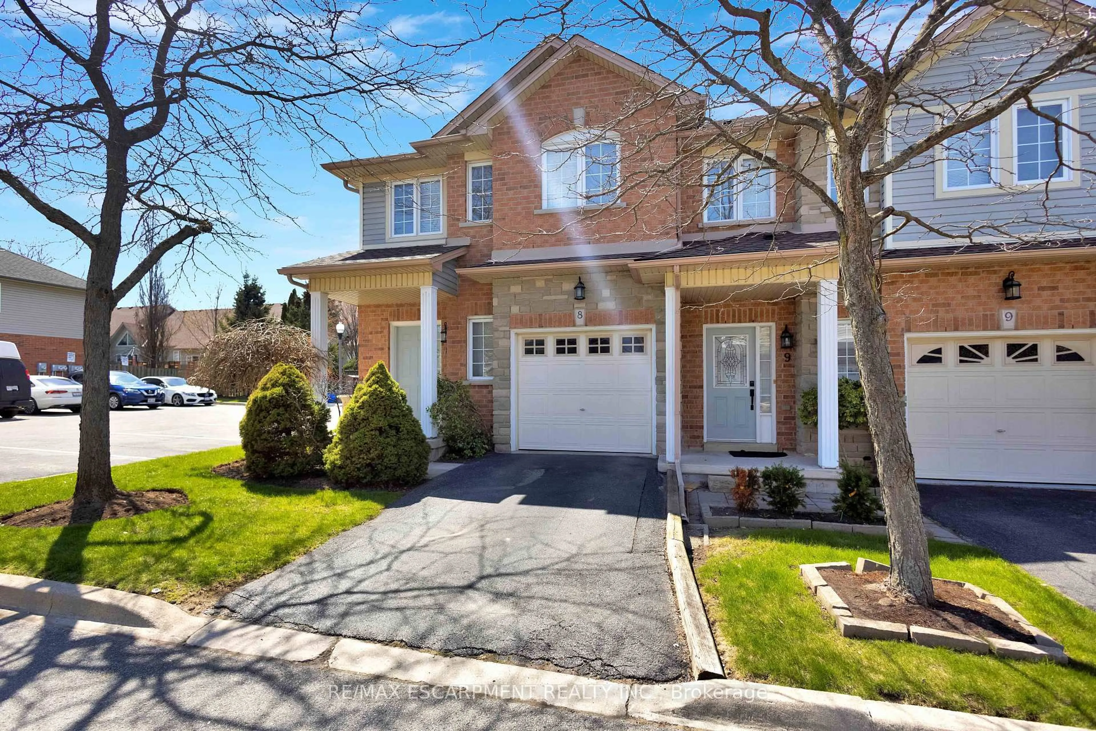 Home with brick exterior material, street for 232 Stonehenge Dr #8, Hamilton Ontario L9K 1R5